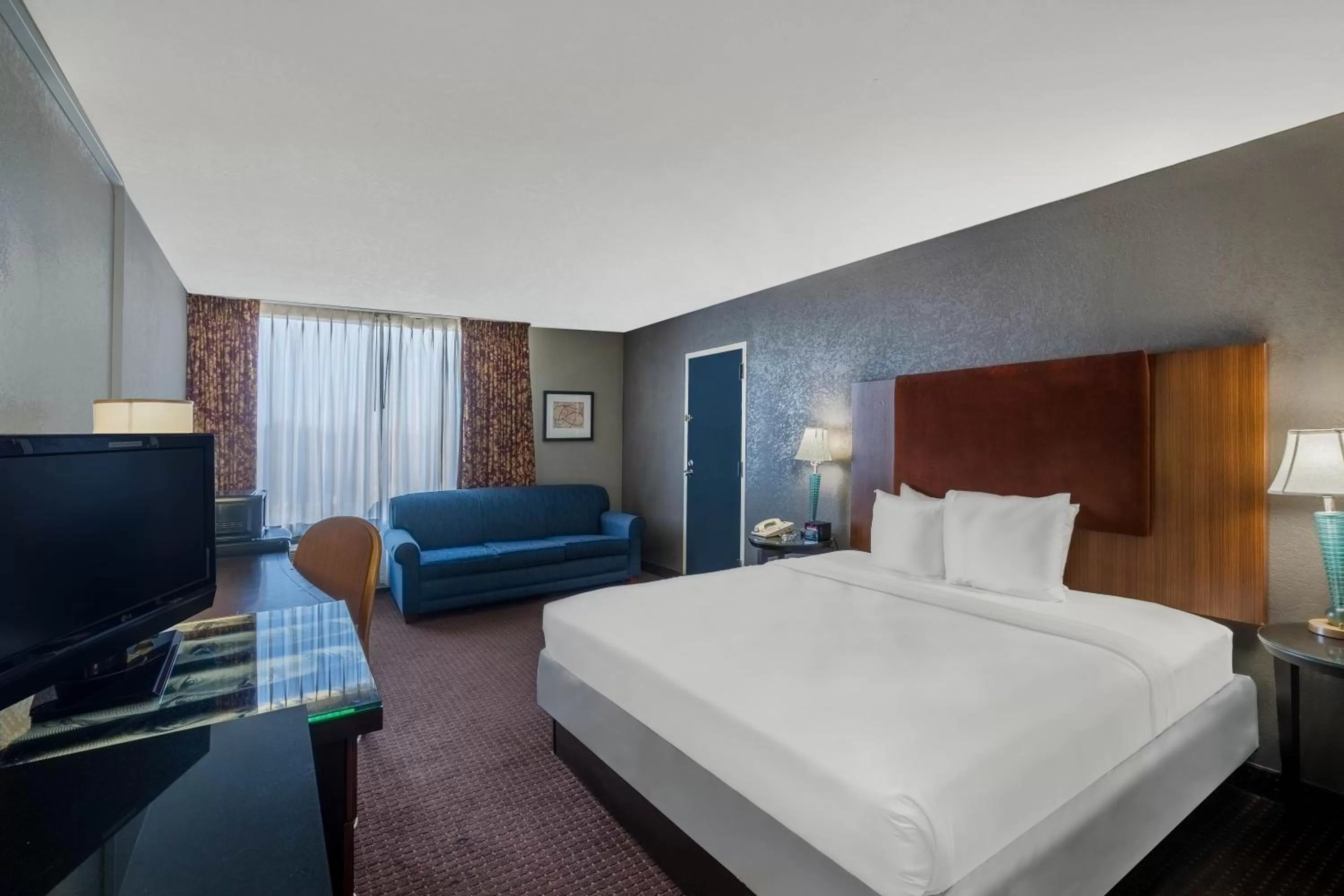 Photo of the whole room in Travelodge by Wyndham Memphis Airport/Graceland