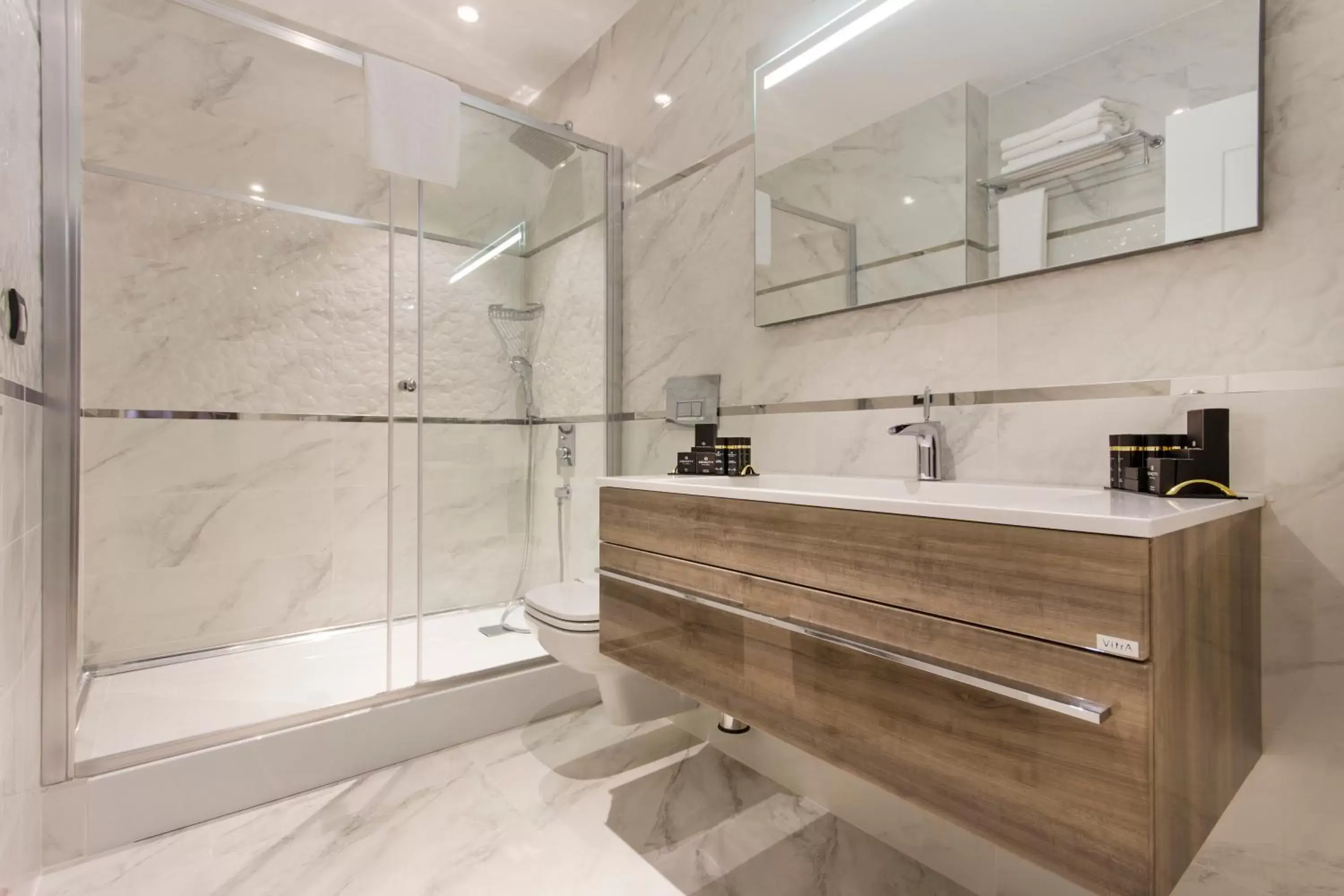 Bathroom in Dencity Hotels & Spa