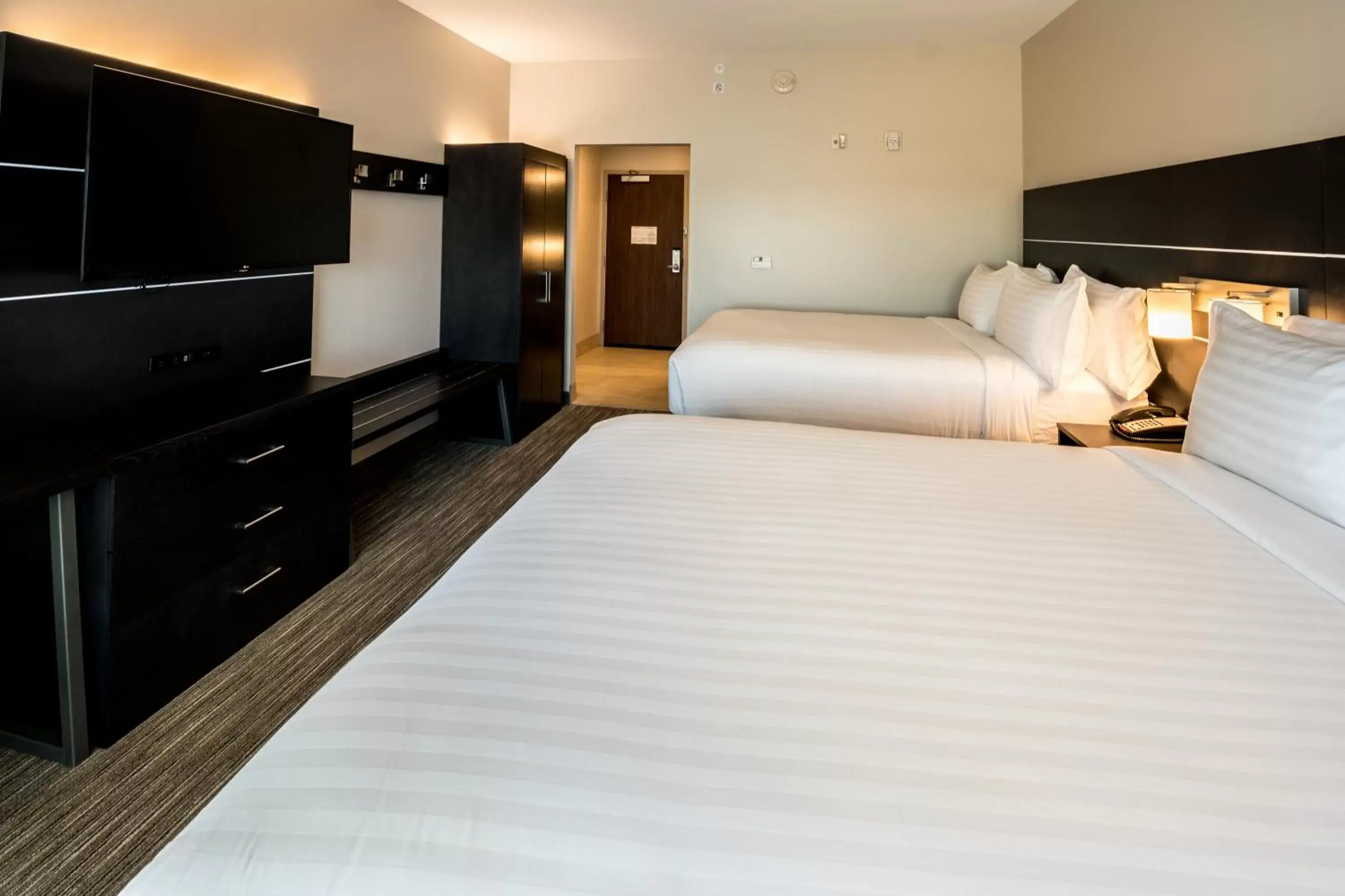 Bed in Holiday Inn Express - North Augusta South Carolina, an IHG Hotel