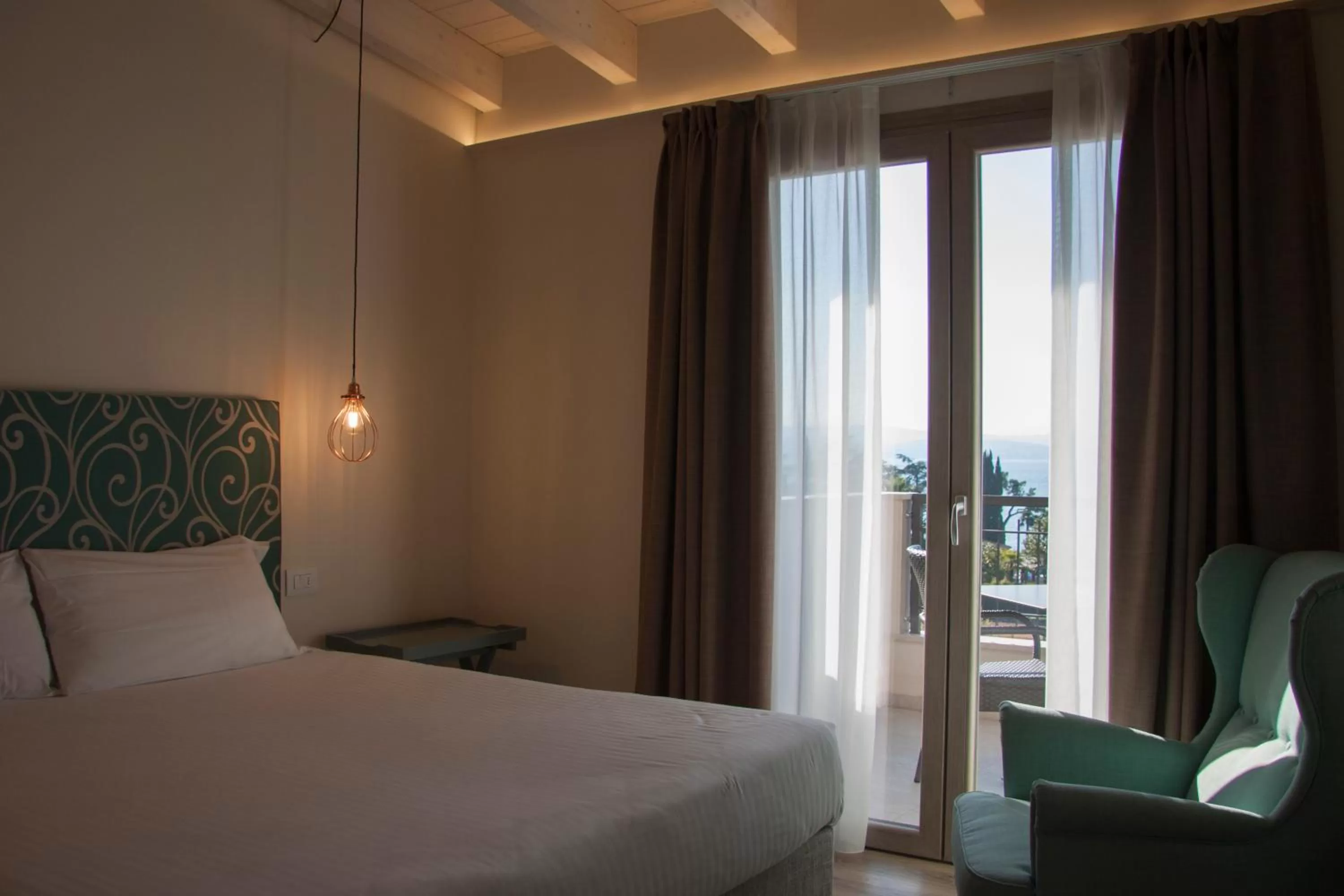 Balcony/Terrace, Bed in Hotel Berta