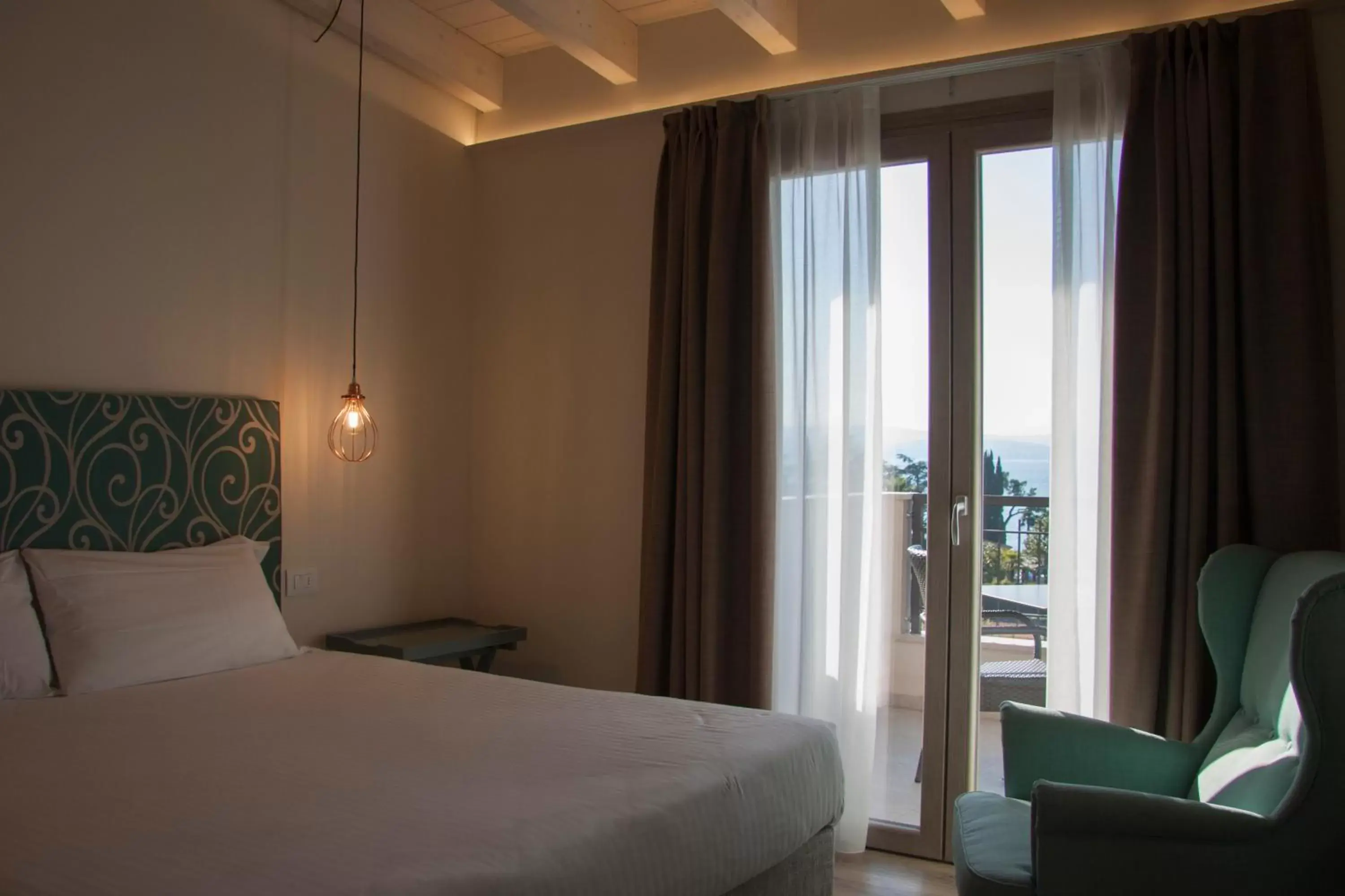 Balcony/Terrace, Bed in Hotel Berta