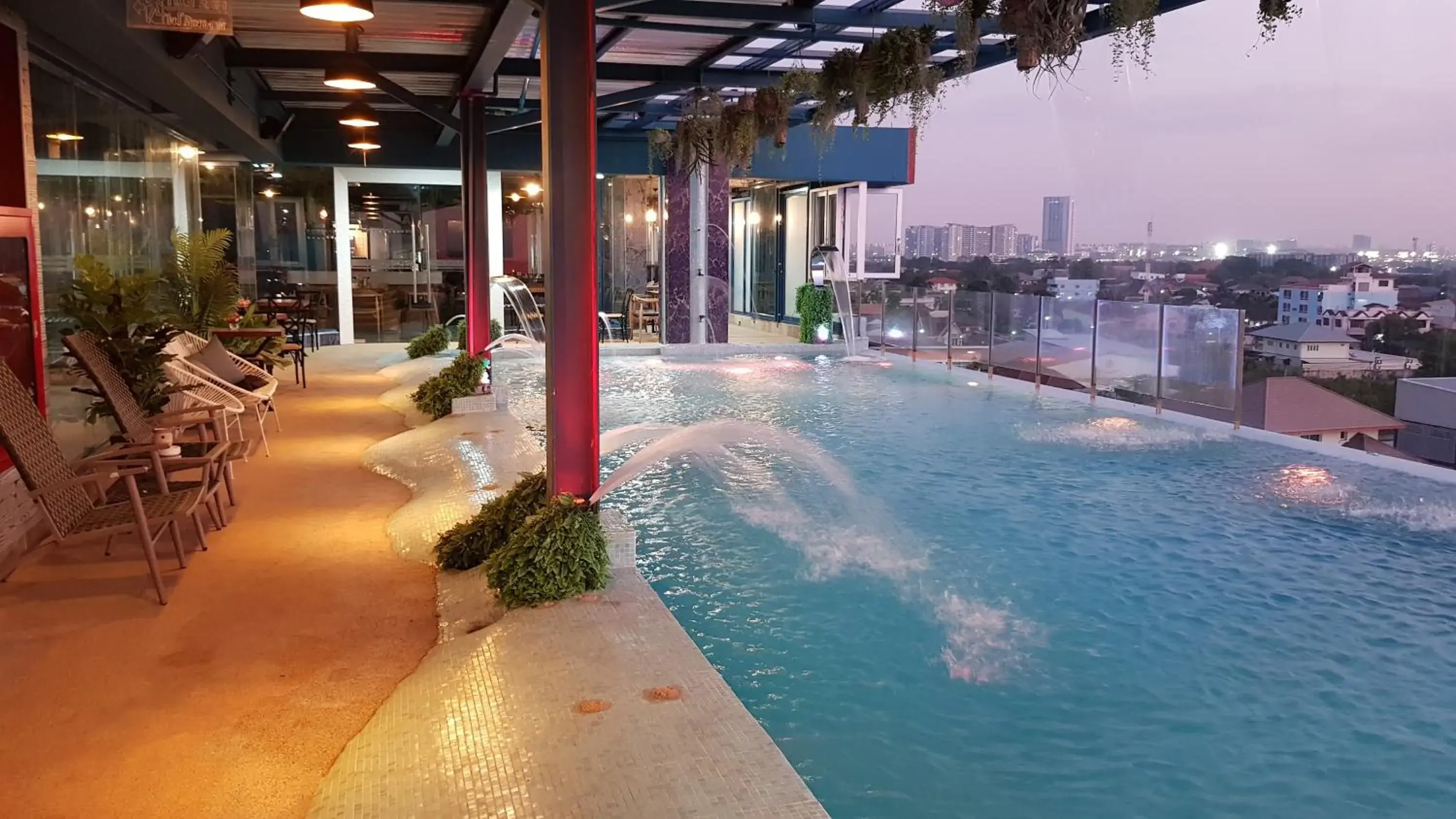 Swimming Pool in BlueTel Re'sidencE Bangkok IMPACT- 1 Time Drop-Off Service to IMPACT