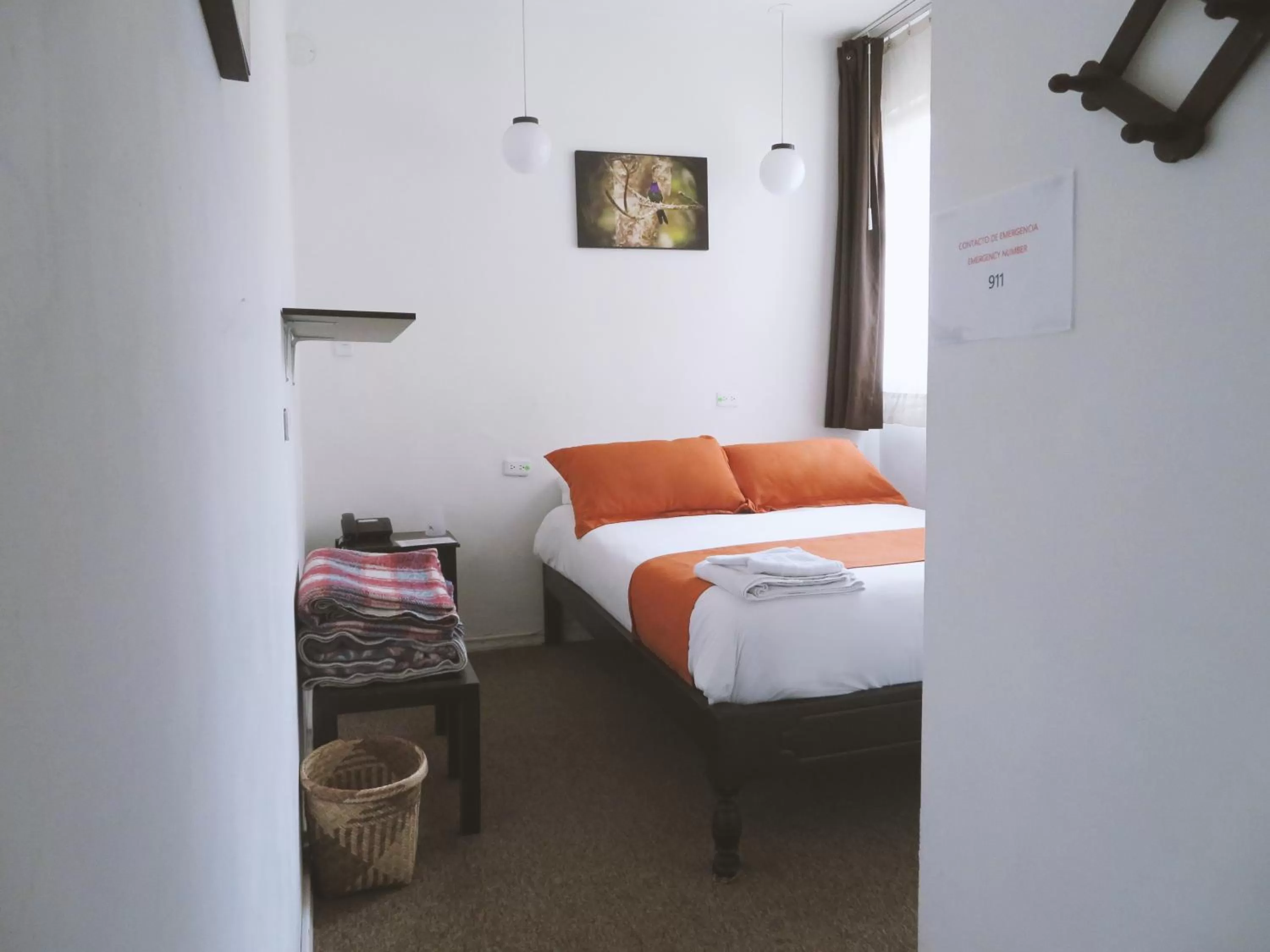 Bed in Bird Garden Guest House