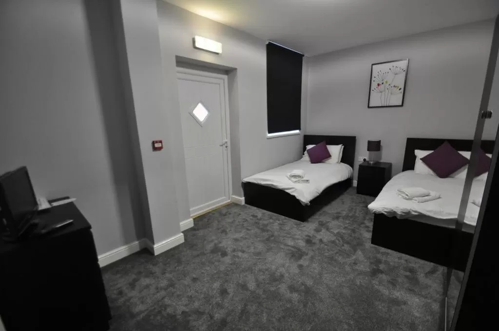 Photo of the whole room, Bed in The Embassy Hotel