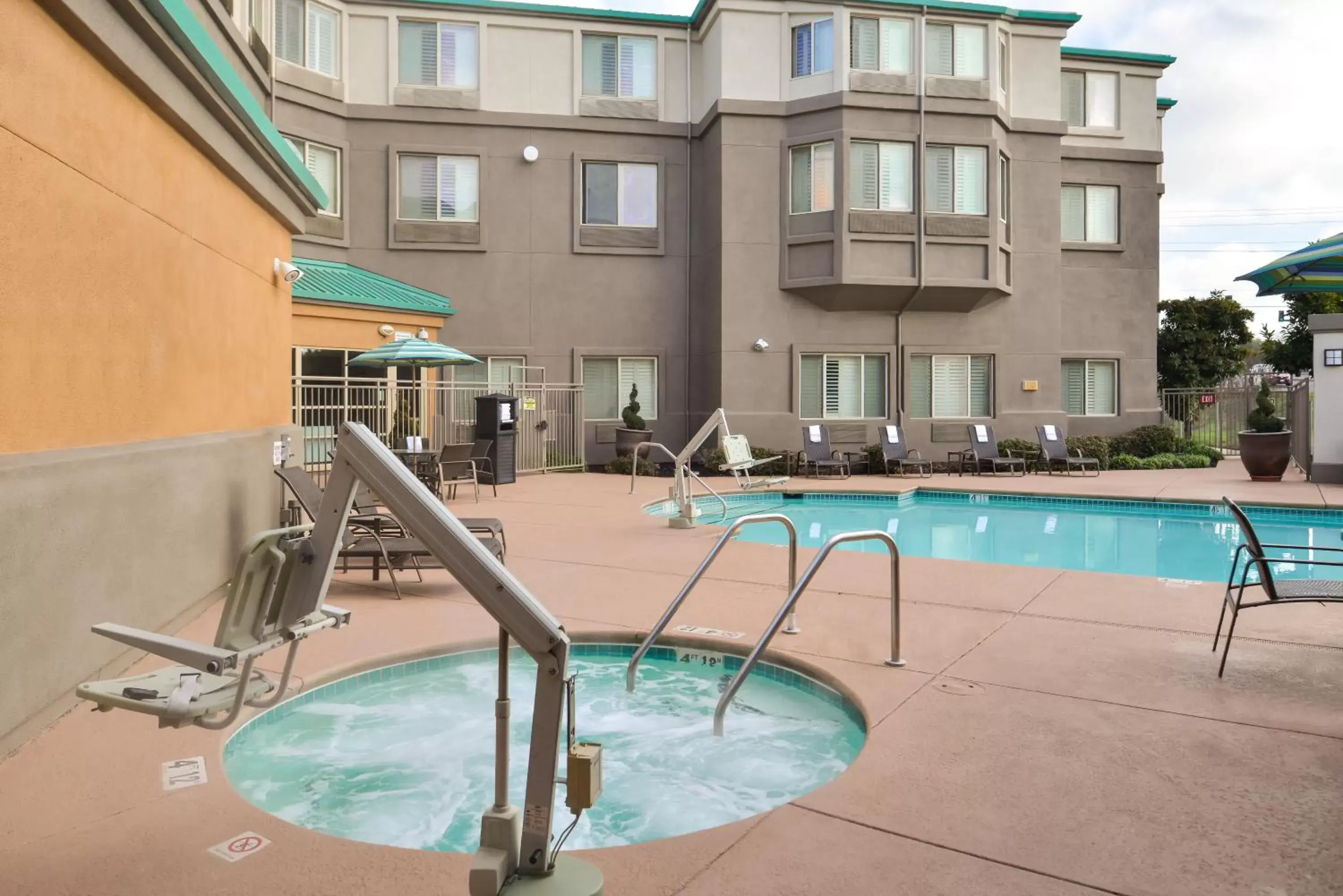 Swimming Pool in HOLIDAY INN EXPRESS & SUITES ELK GROVE CENTRAL - HWY 99, an IHG Hotel