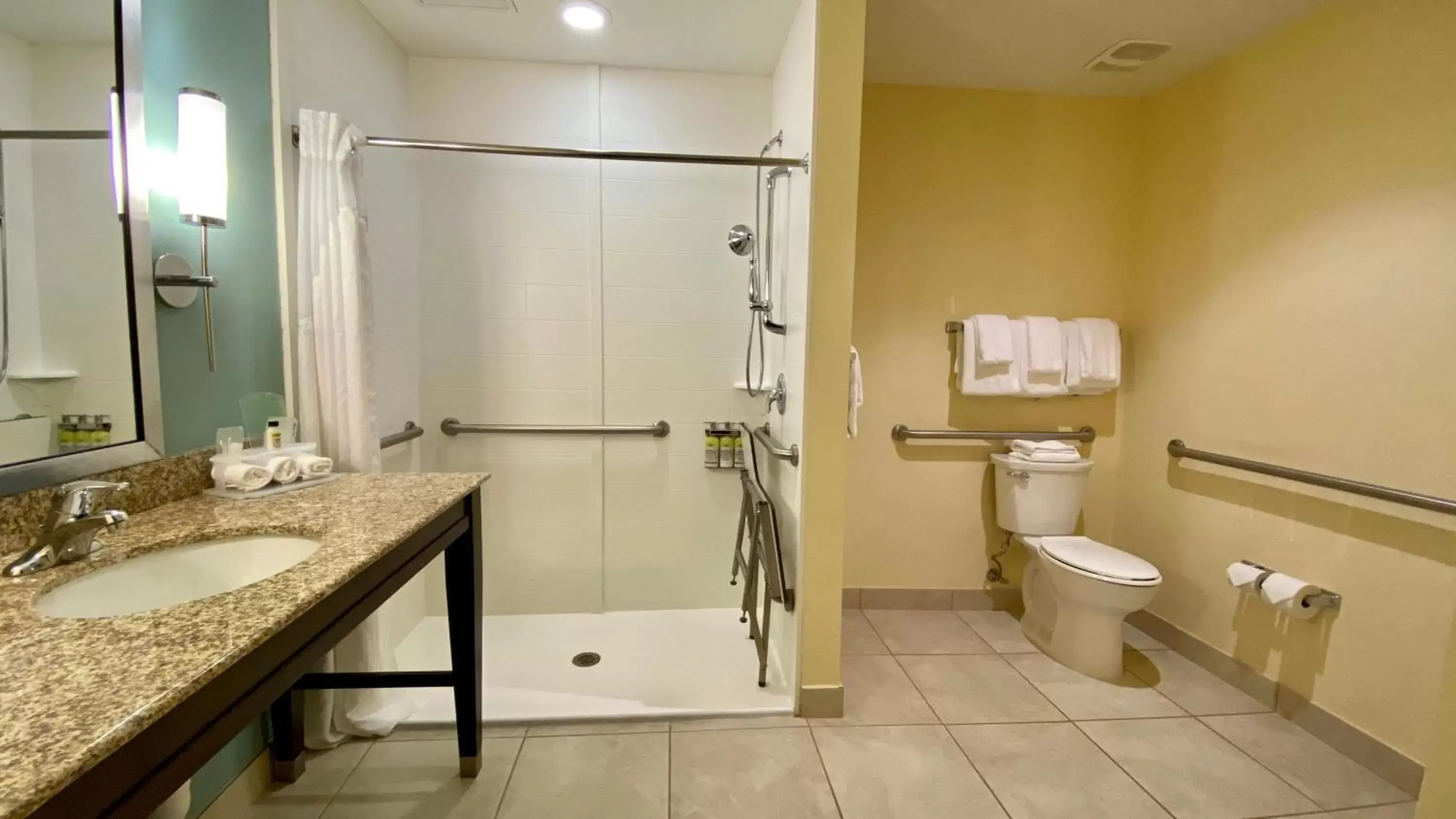Photo of the whole room, Bathroom in Holiday Inn Express Hotel & Suites Orlando East-UCF Area, an IHG Hotel