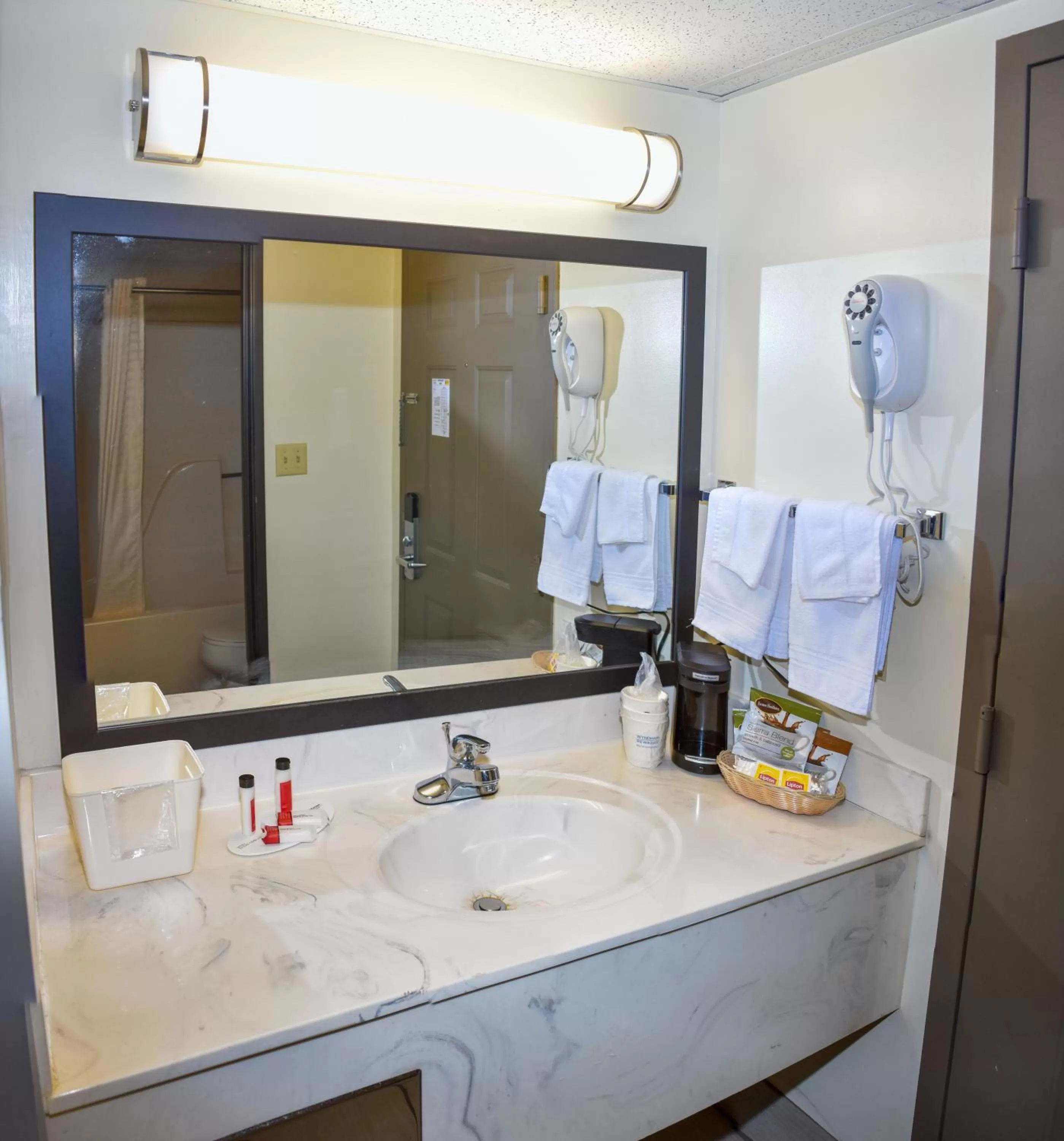 Bathroom in Super 8 by Wyndham Branson By Andy Williams Theatre