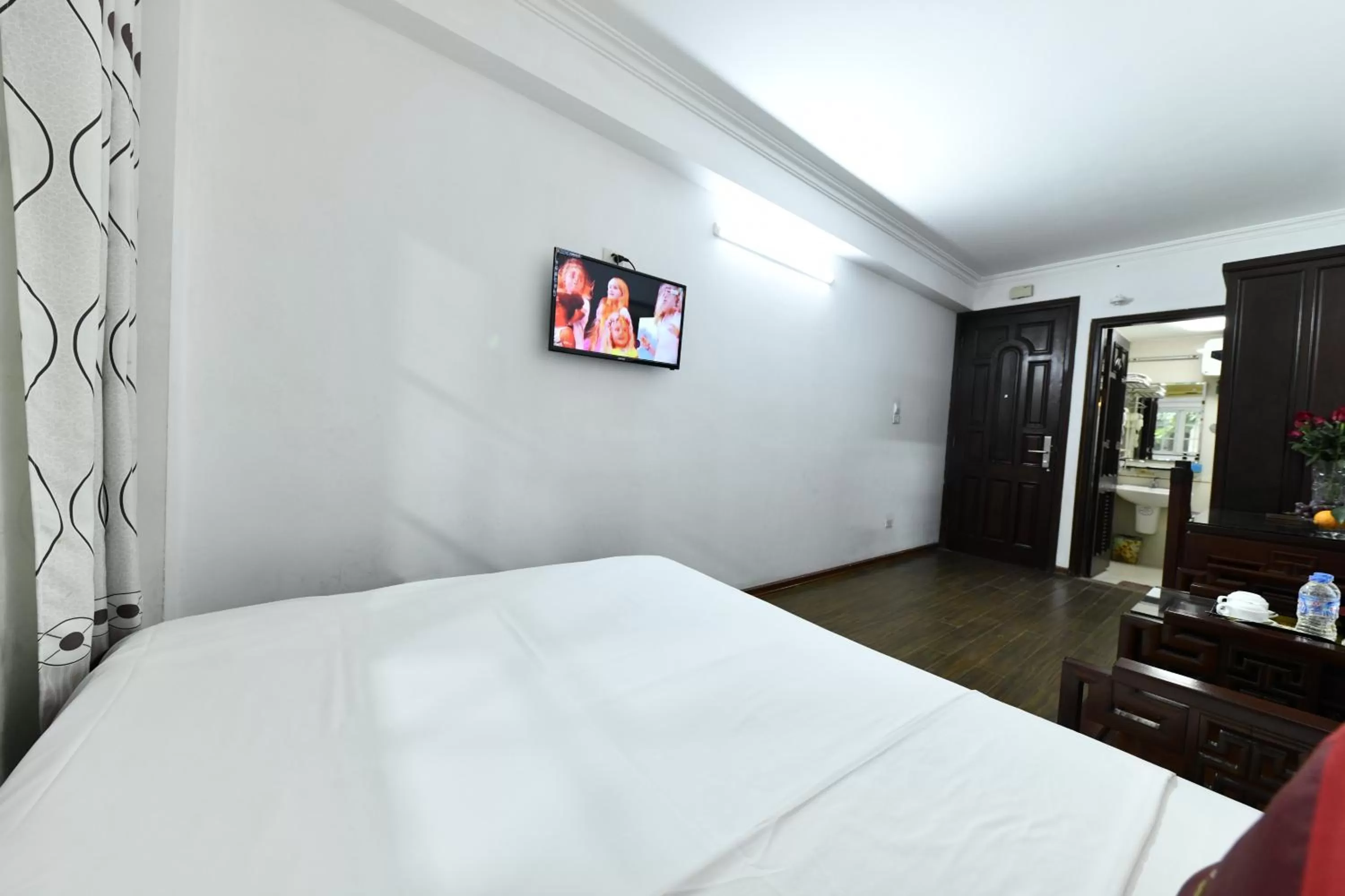 Bed in Phoenix Legend Hotel Hanoi