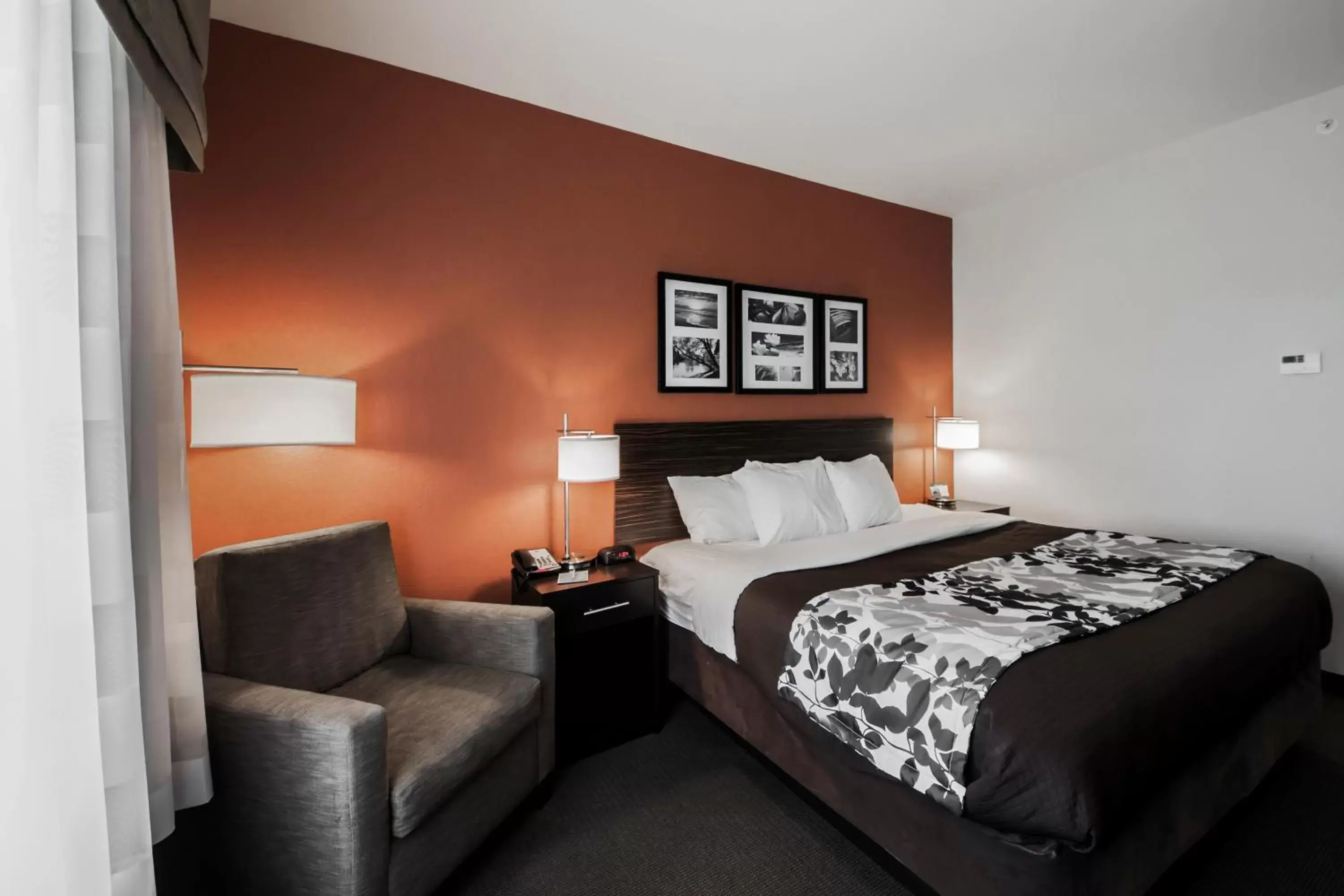 Bed in Sleep Inn & Suites Hennessey North