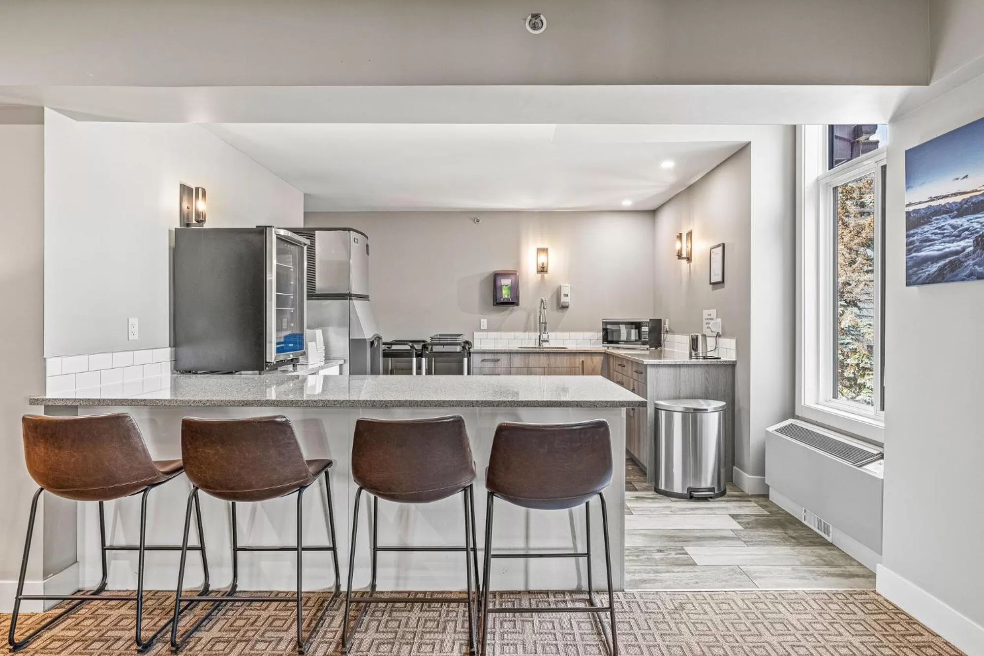 Communal lounge/ TV room in Basecamp Lodge Canmore