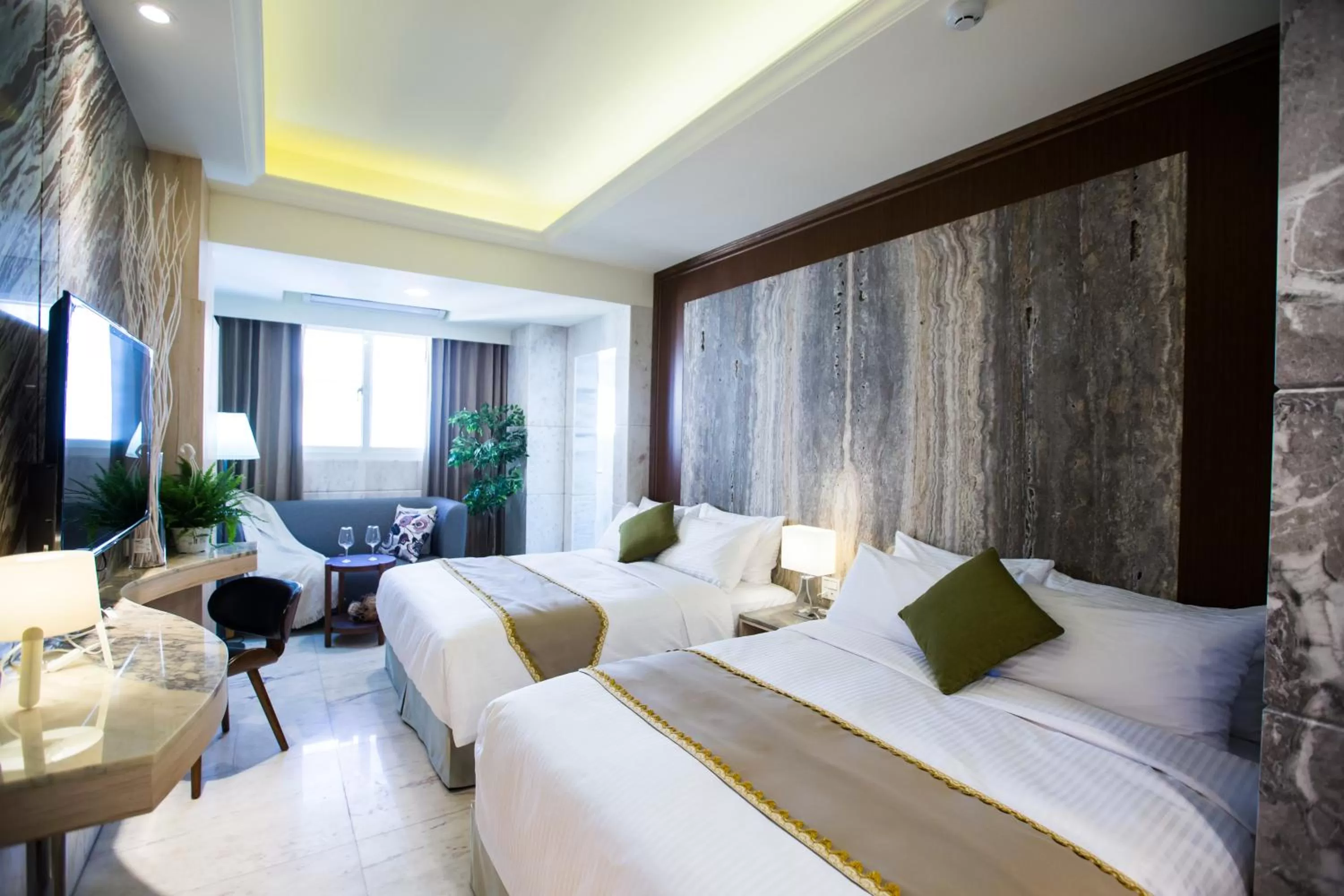 Bed in Hotel Maple Taiwan Boulevard