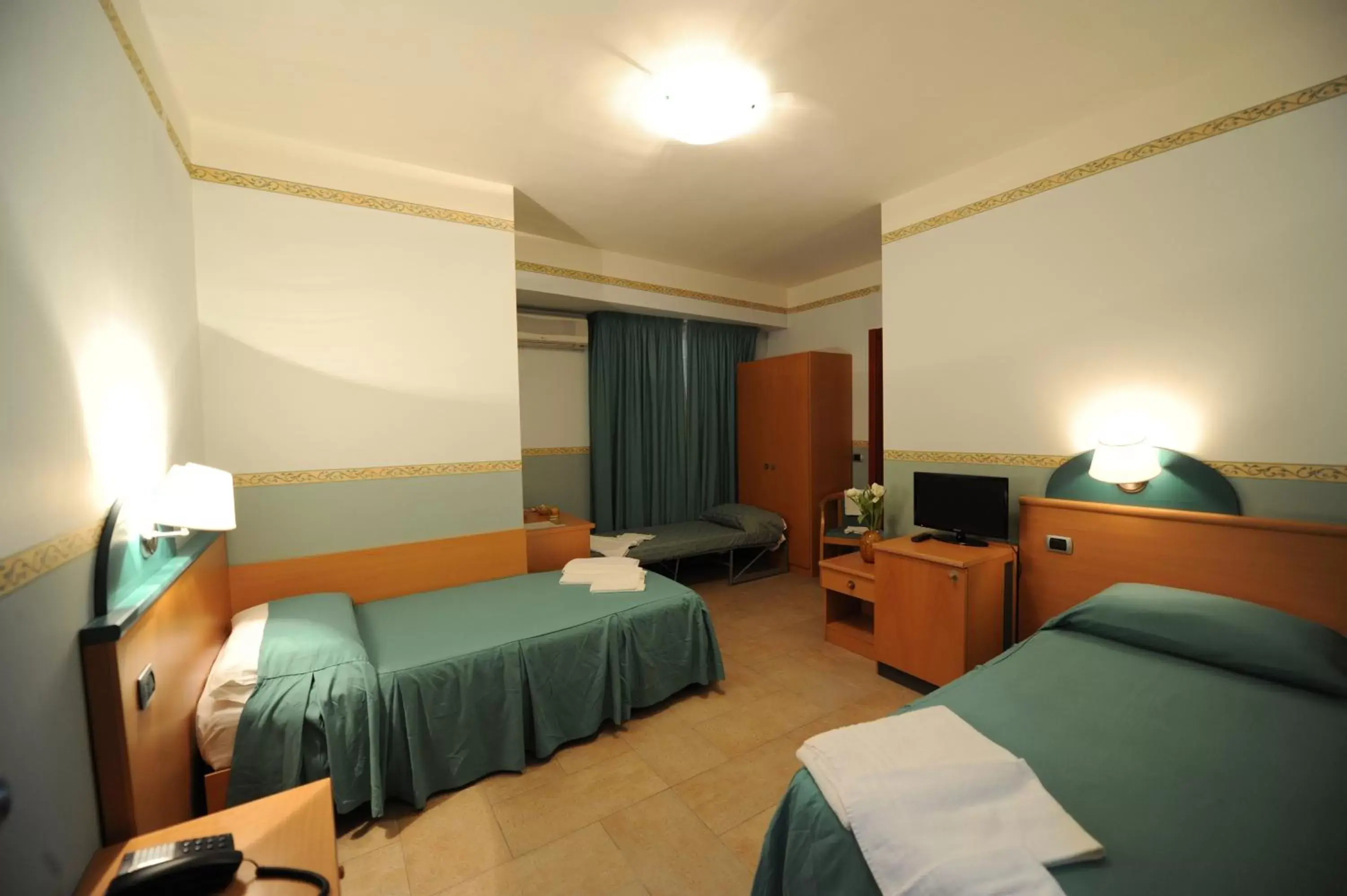 Quadruple Room in Santa Lucia Hotel