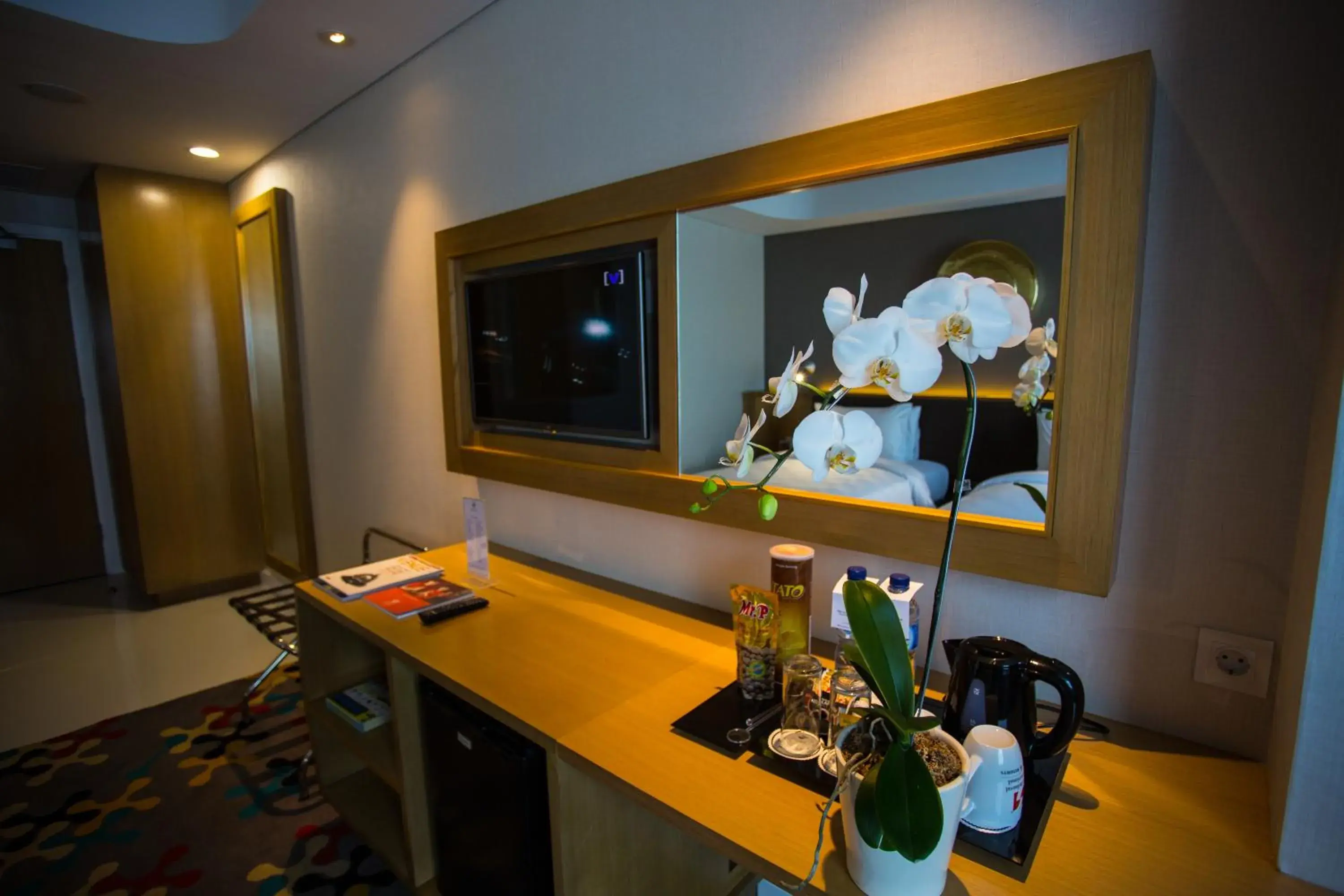 Decorative detail, TV/Entertainment Center in Hotel Ciputra Cibubur managed by Swiss-Belhotel International