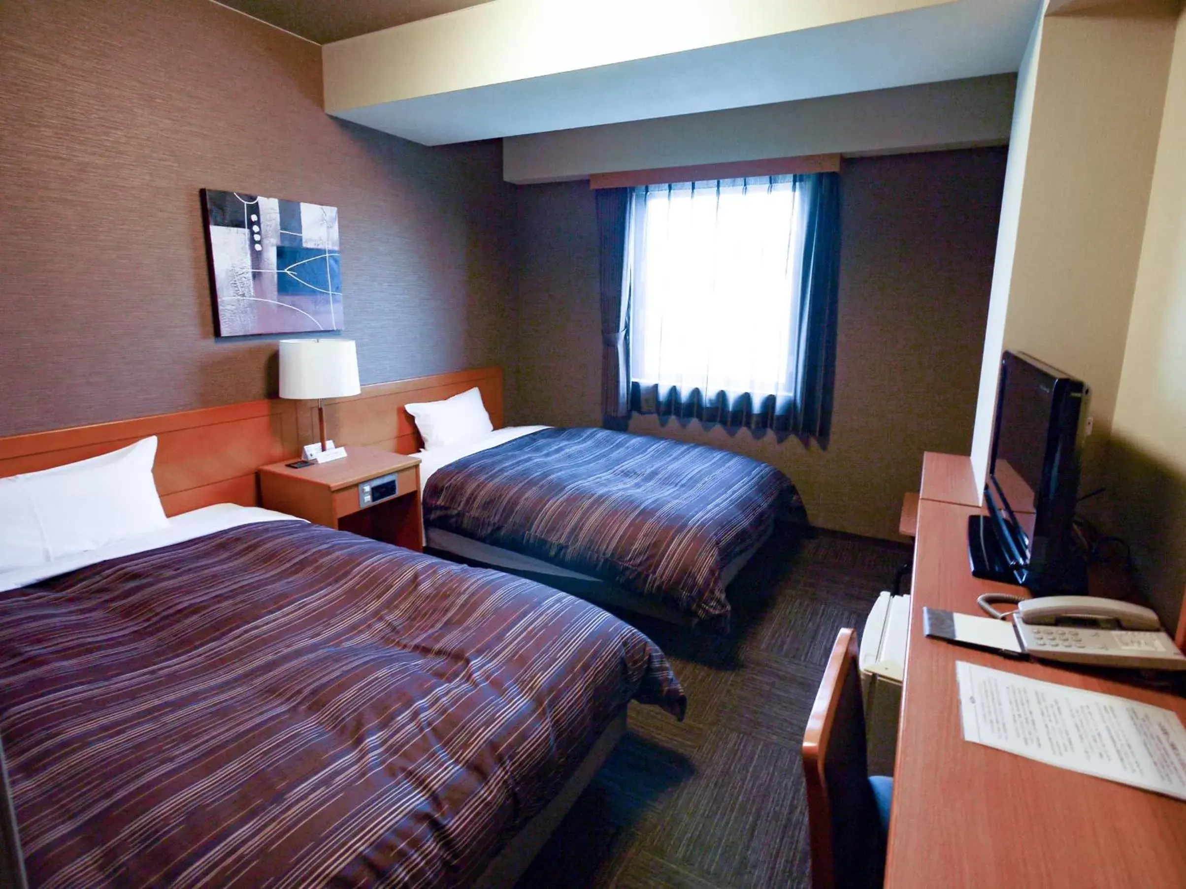 Bed in Hotel Route-Inn Tokoname Ekimae