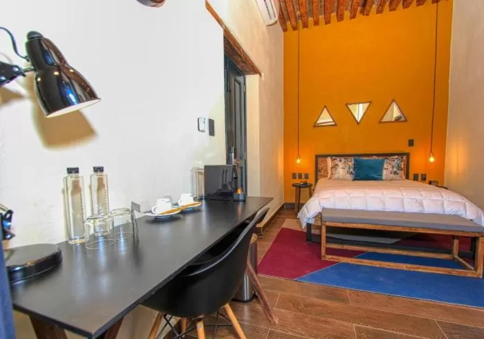 Bed in Antigua Trece Hotel Fusión