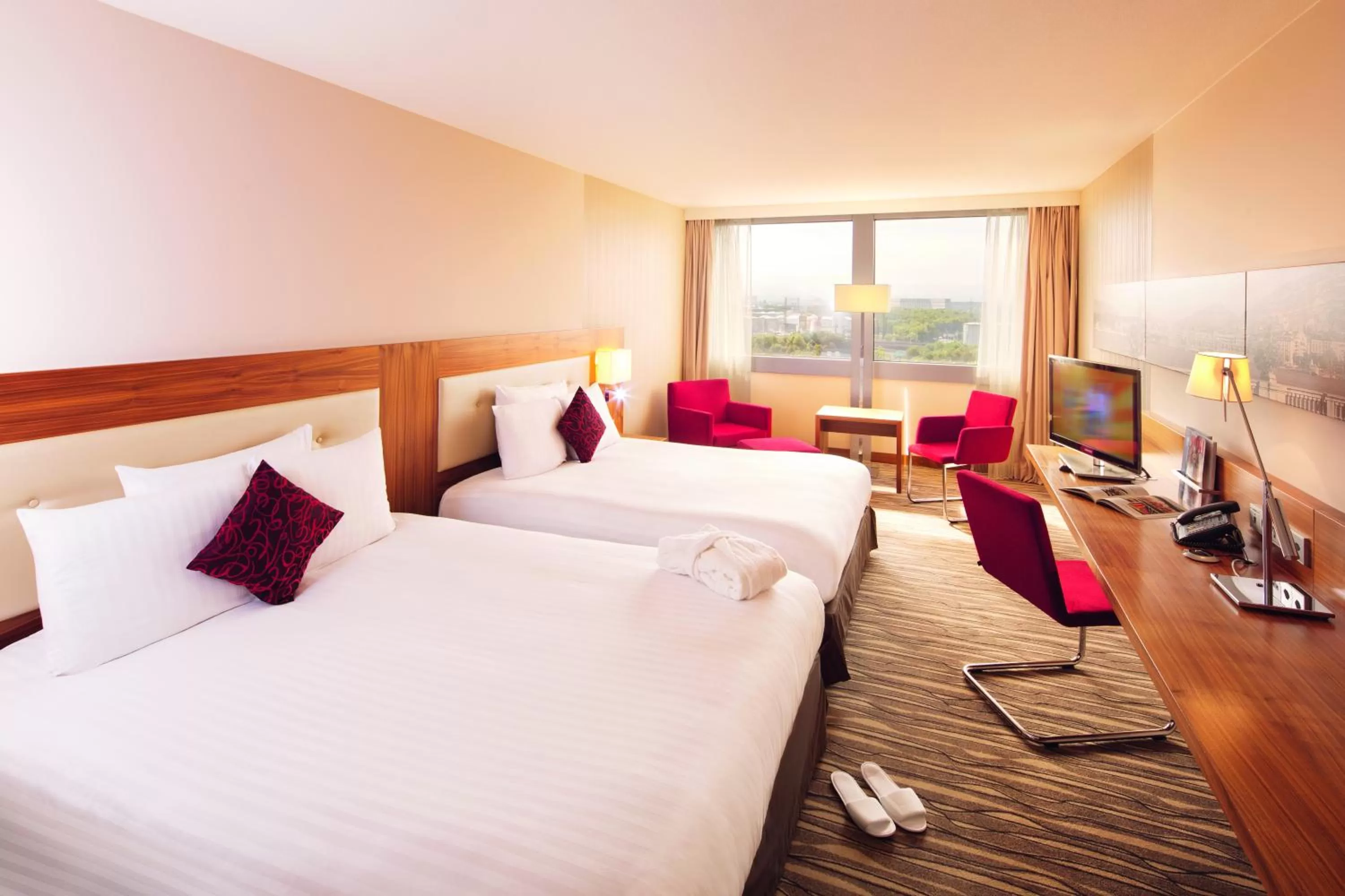 Bed in Mövenpick Hotel Geneva