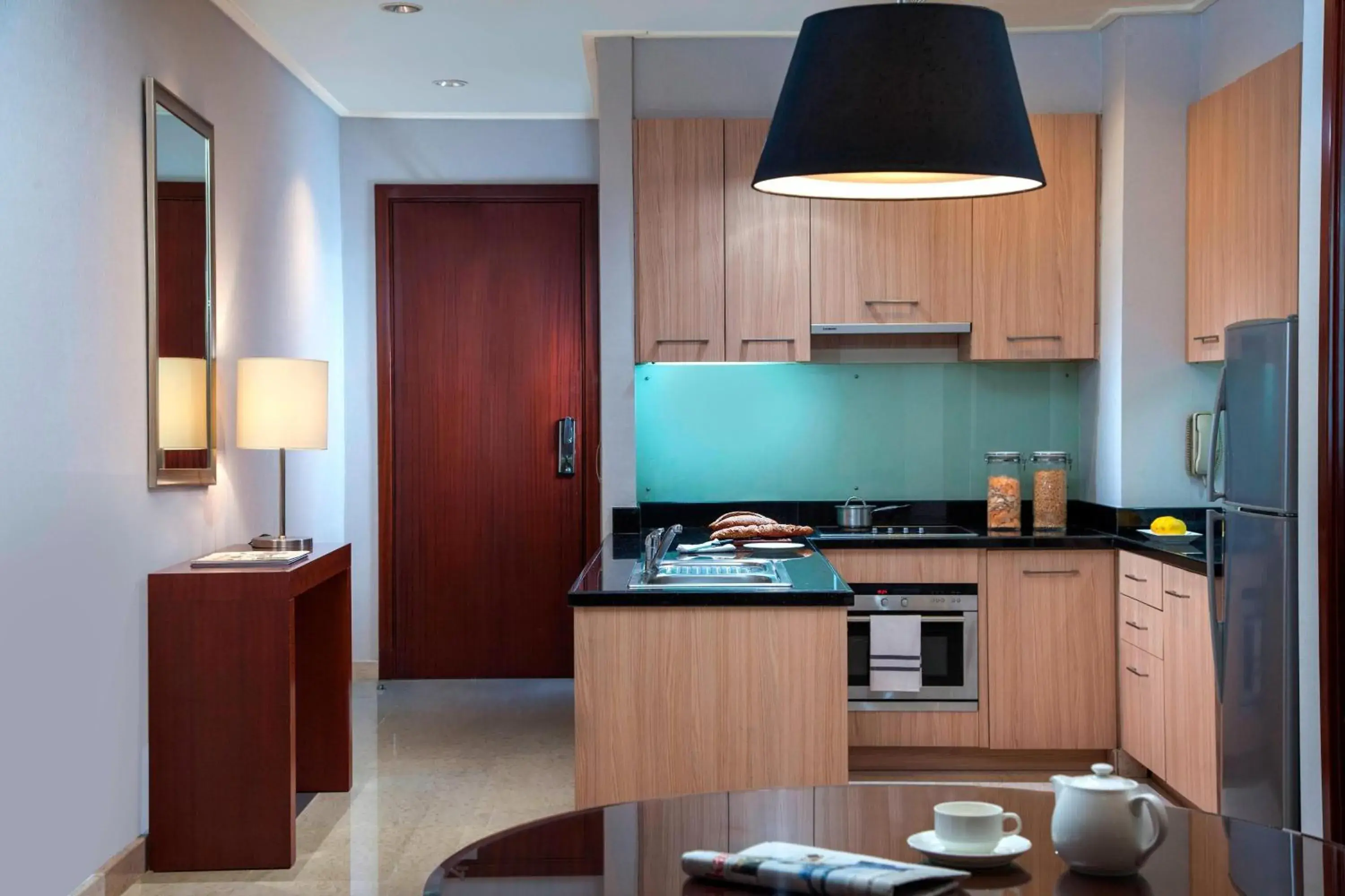 Bedroom, Kitchen/Kitchenette in The Mayflower, Jakarta-Marriott Executive Apartments