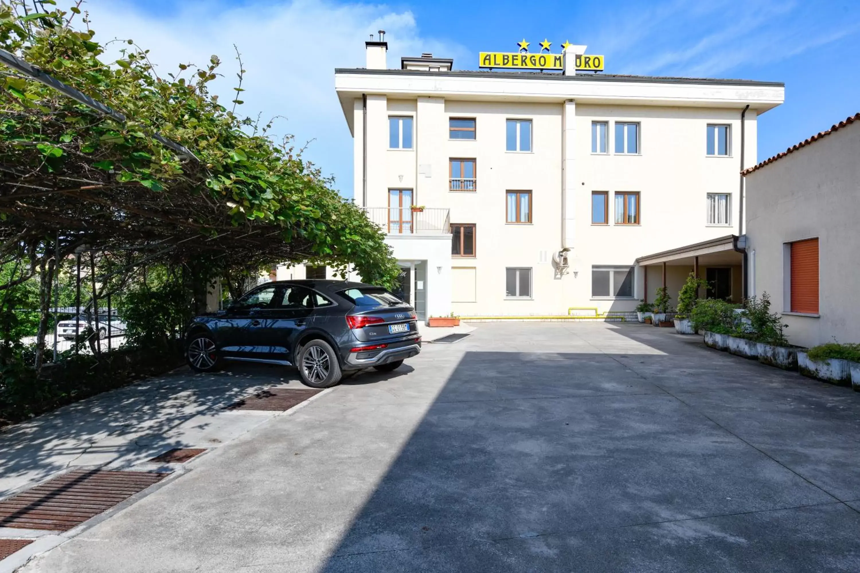 Parking, Property Building in Hotel Mauro