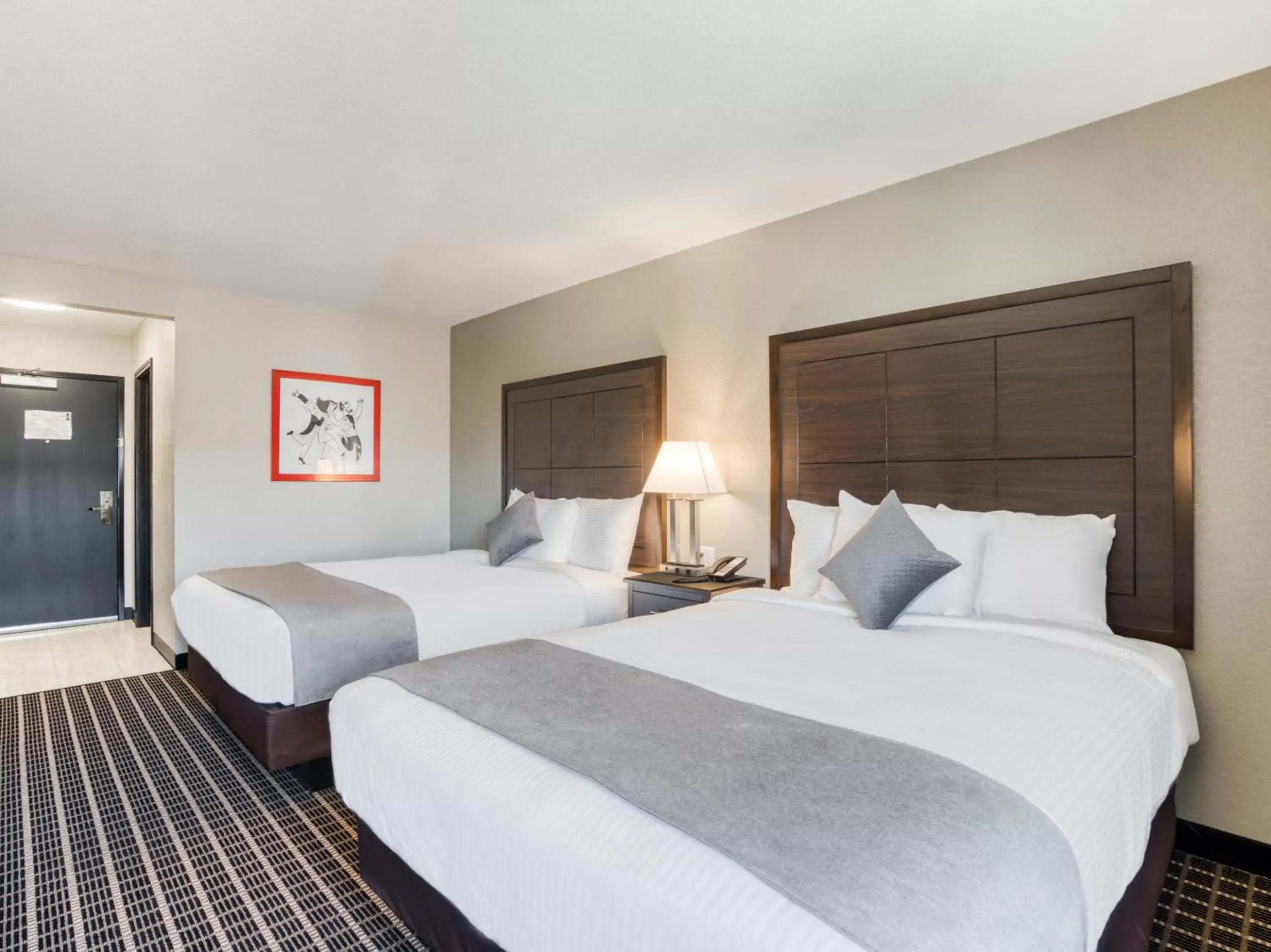 Bedroom, Bed in Alexis Hotel & Banquets Dallas Park Central Galleria