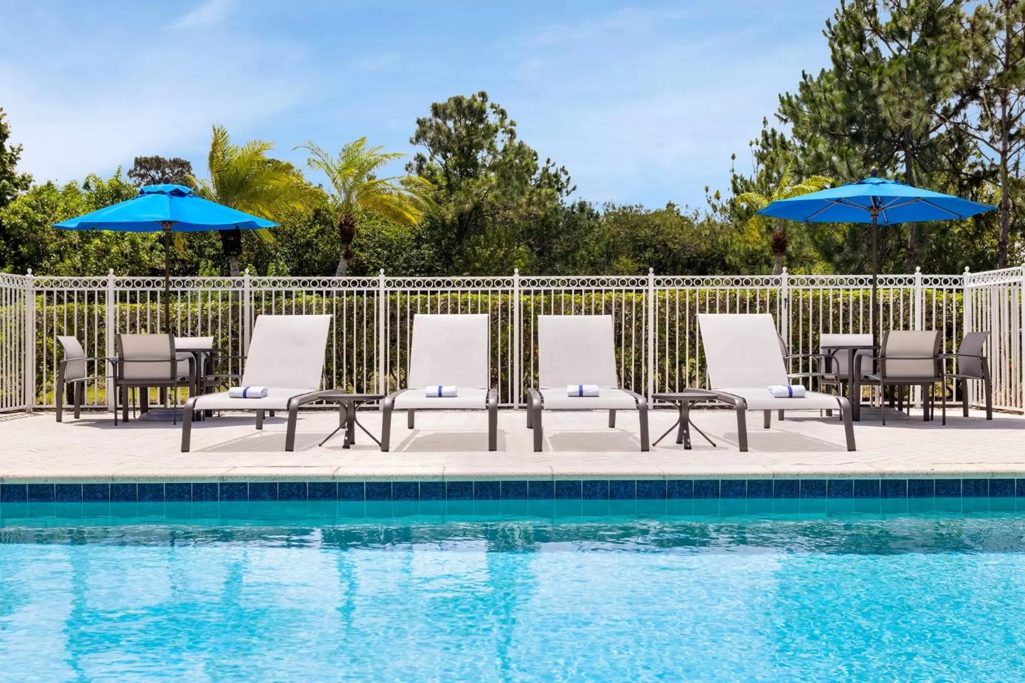 Swimming pool in Holiday Inn Express Hotel & Suites Fort Pierce West by IHG
