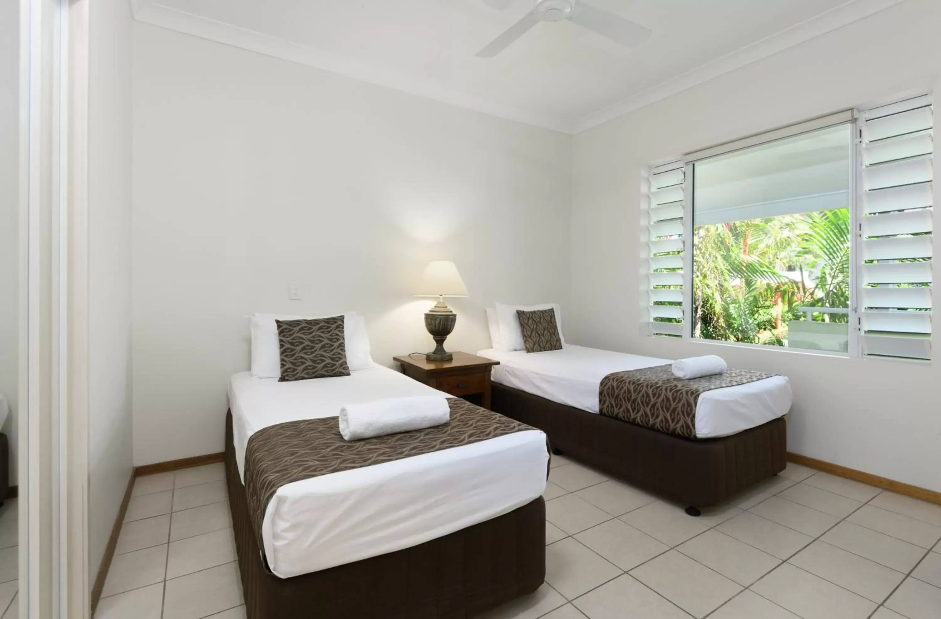 Bed in Verandahs Boutique Apartments