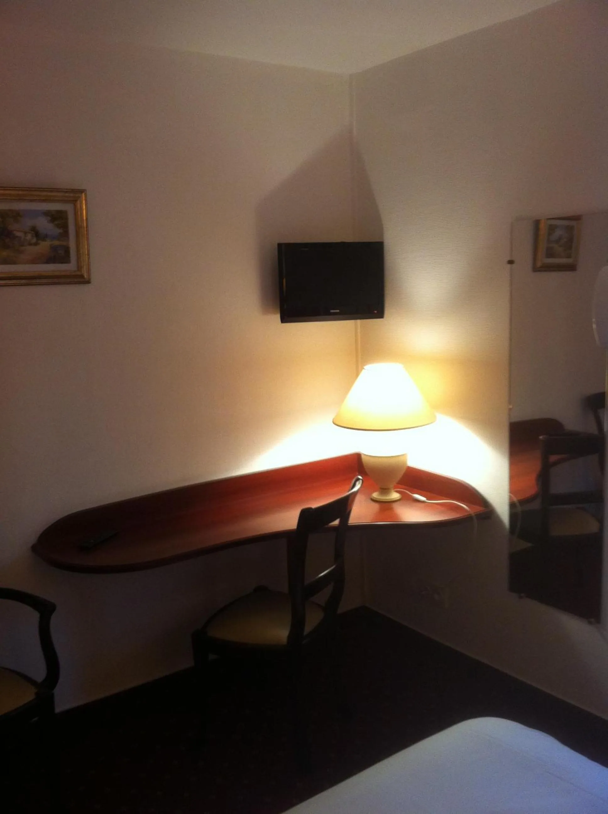 Seating area, Bed in Hotel Couleurs Sud Centre-ville Gare Charleville-Mézières