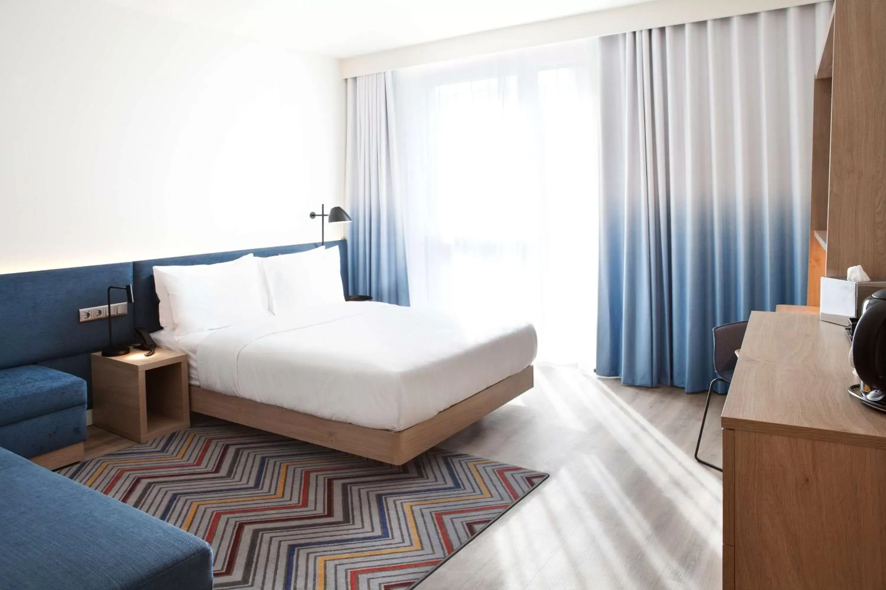 Bed in Hampton by Hilton Munich Airport South Bed in Hampton by Hilton Munich Airport South