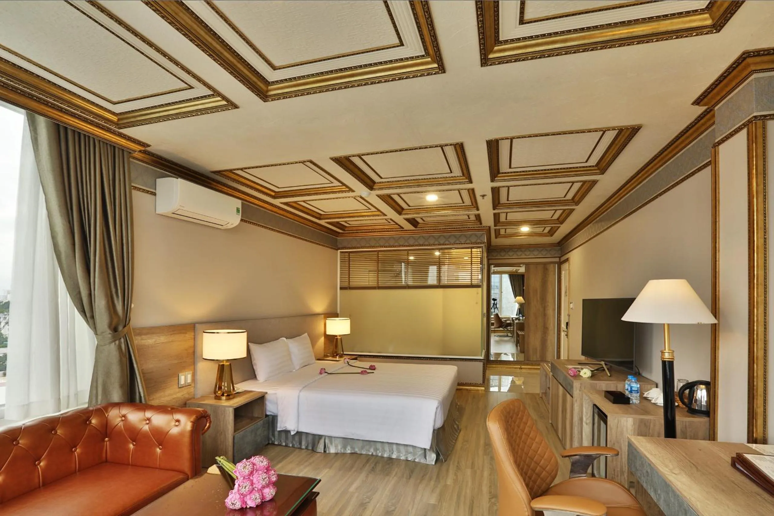 Photo of the whole room, Bed in Lotus Saigon Hotel