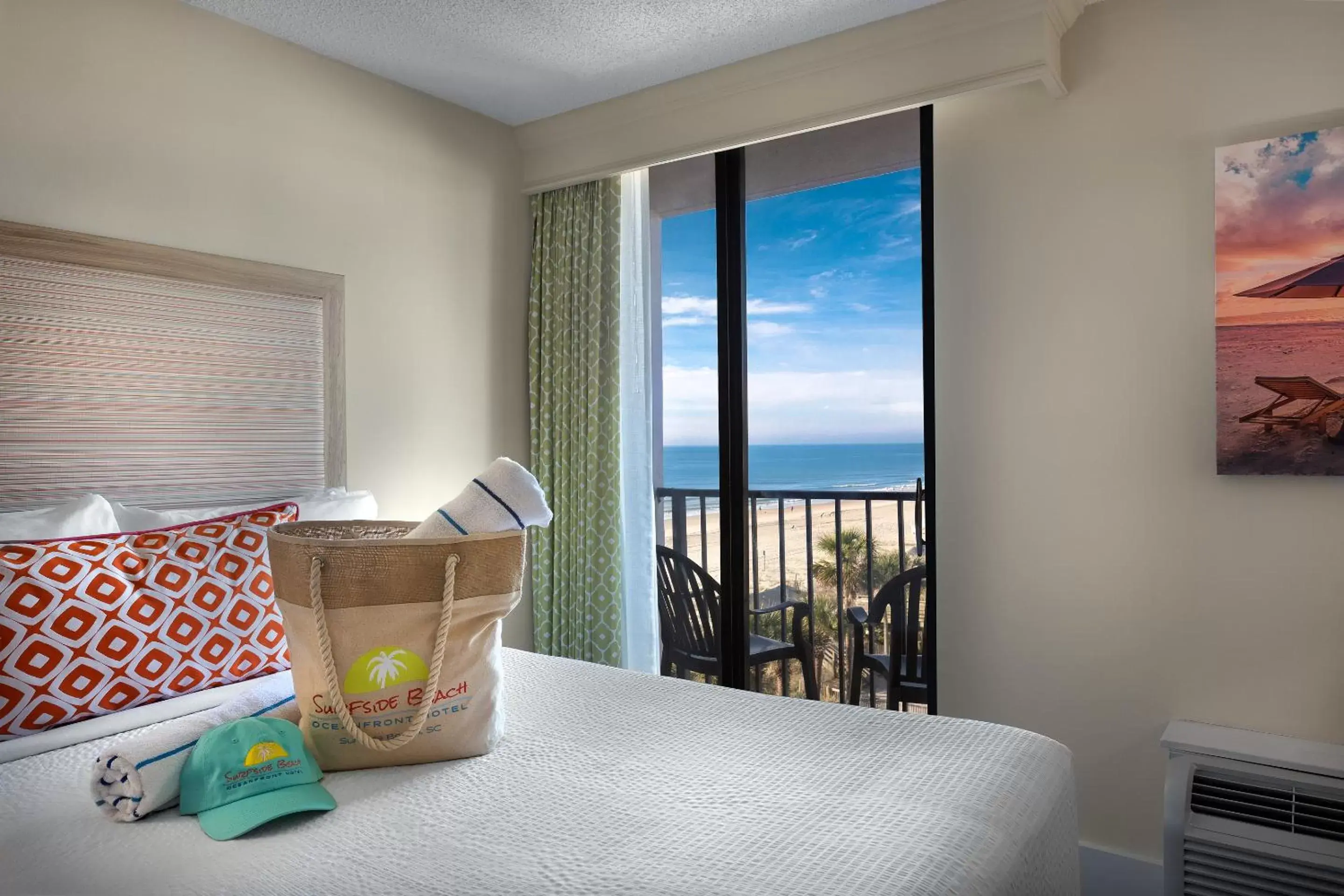 Bed in Surfside Beach Oceanfront Hotel