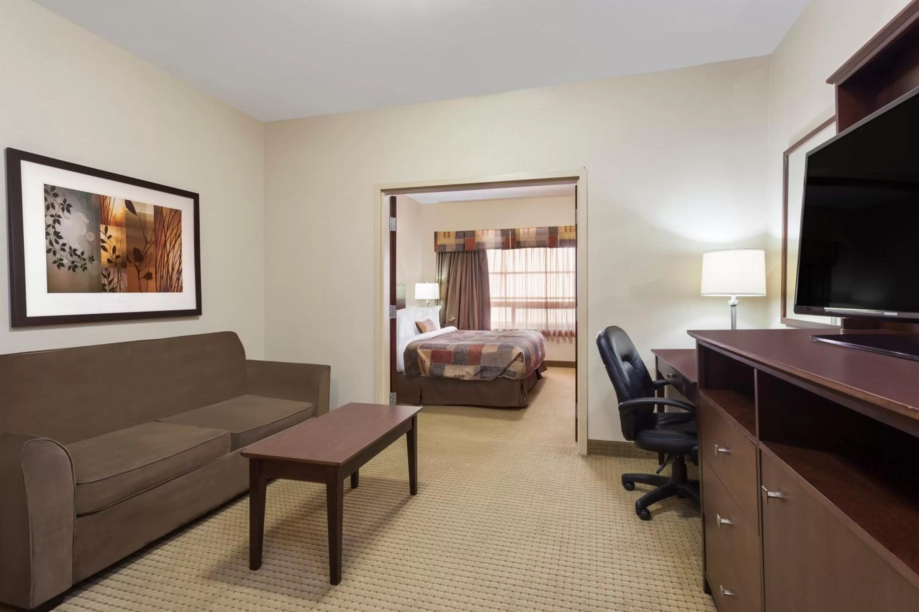 Bedroom, Bed in Ramada by Wyndham Weyburn
