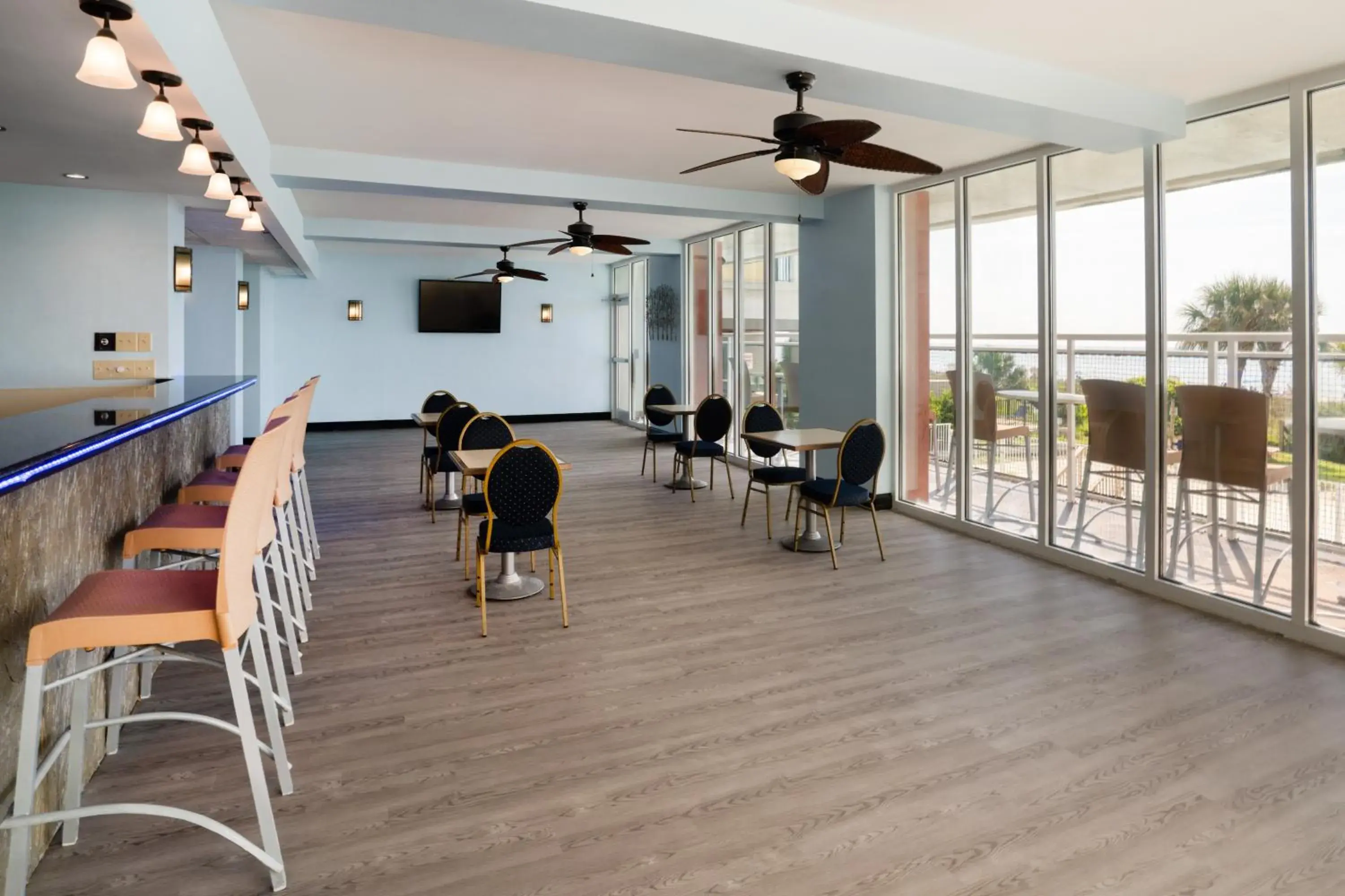 Lobby or reception, Restaurant/Places to Eat in Palette Resort Myrtle Beach by OYO