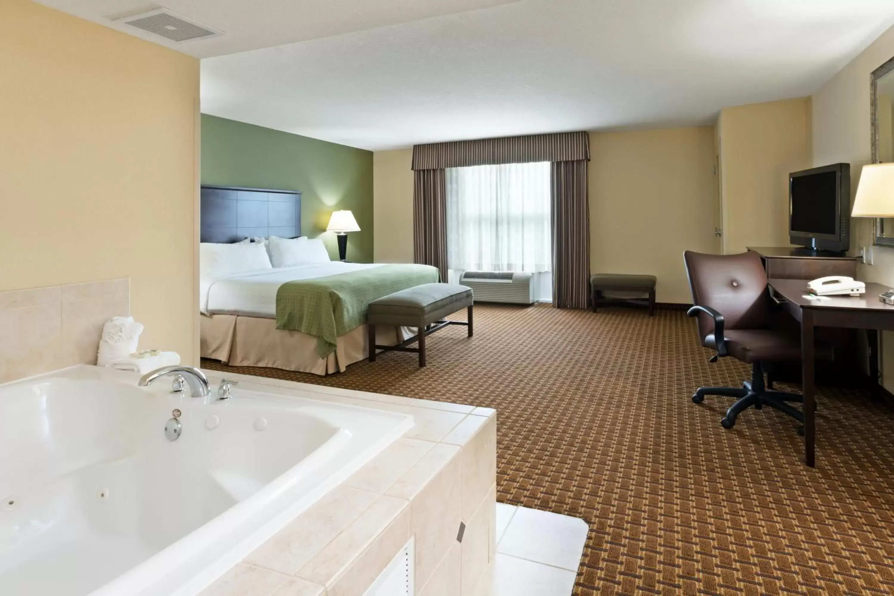 Bedroom in Holiday Inn Daytona Beach LPGA Boulevard, an IHG Hotel