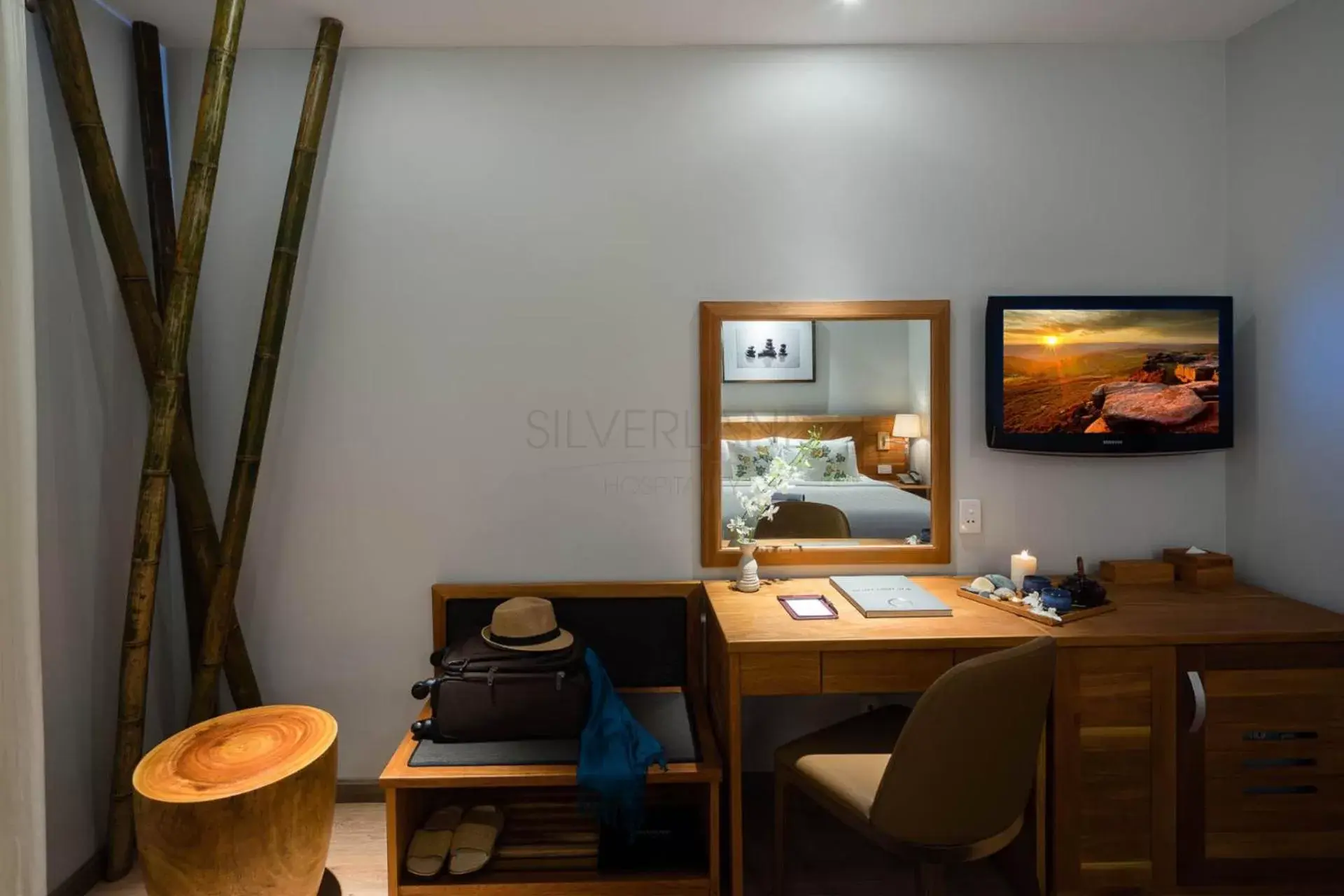 Living room, TV/Entertainment Center in Silverland Yen Hotel