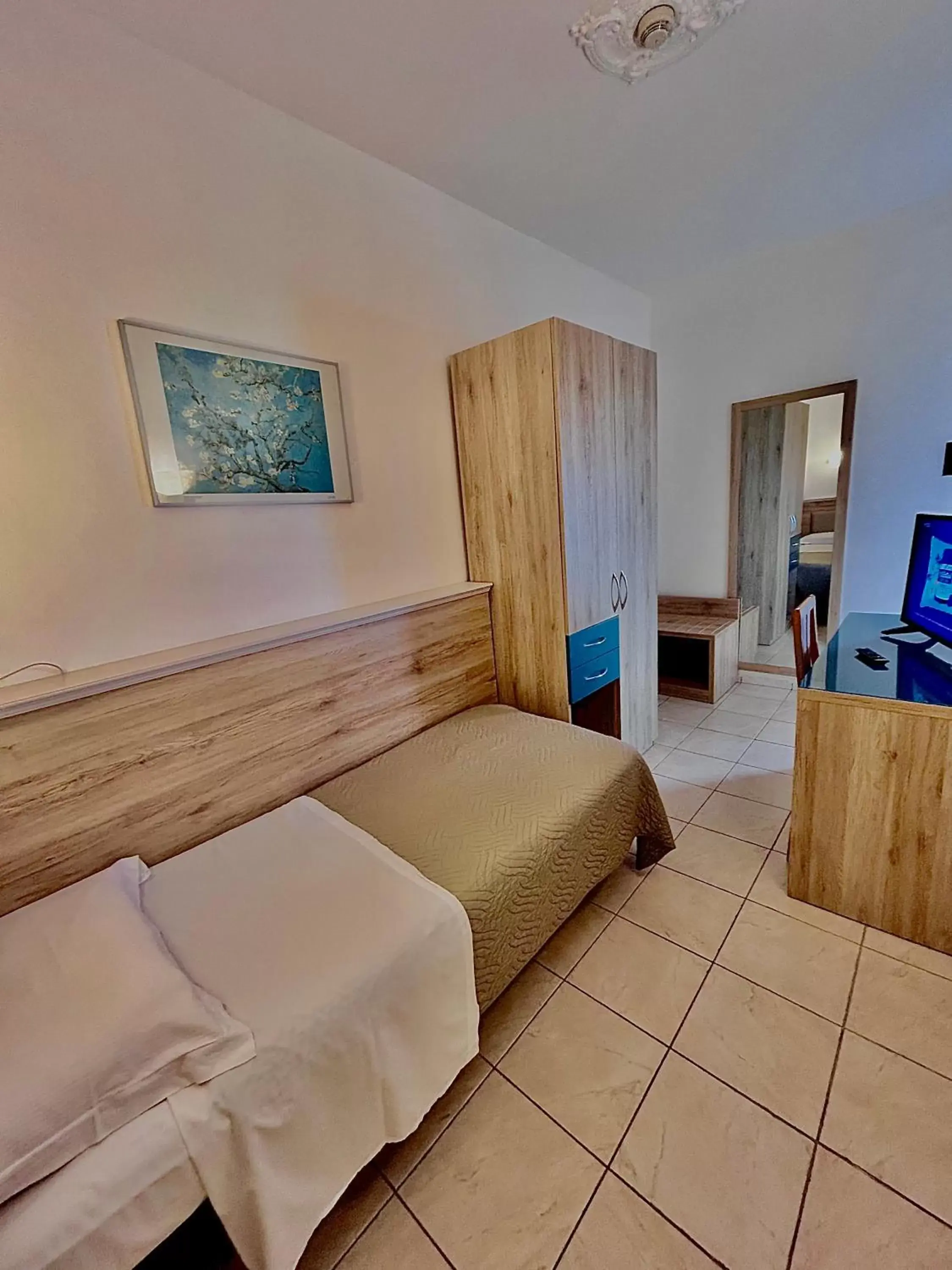 Bedroom, Seating Area in Hotel Adria