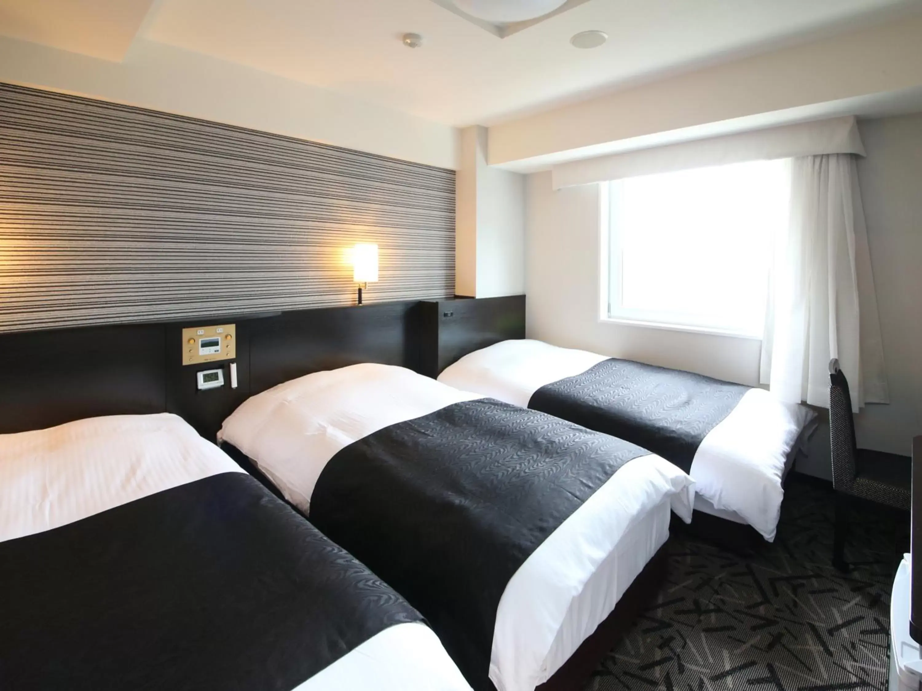 Photo of the whole room, Bed in APA Hotel & Resort Tokyo Bay Makuhari