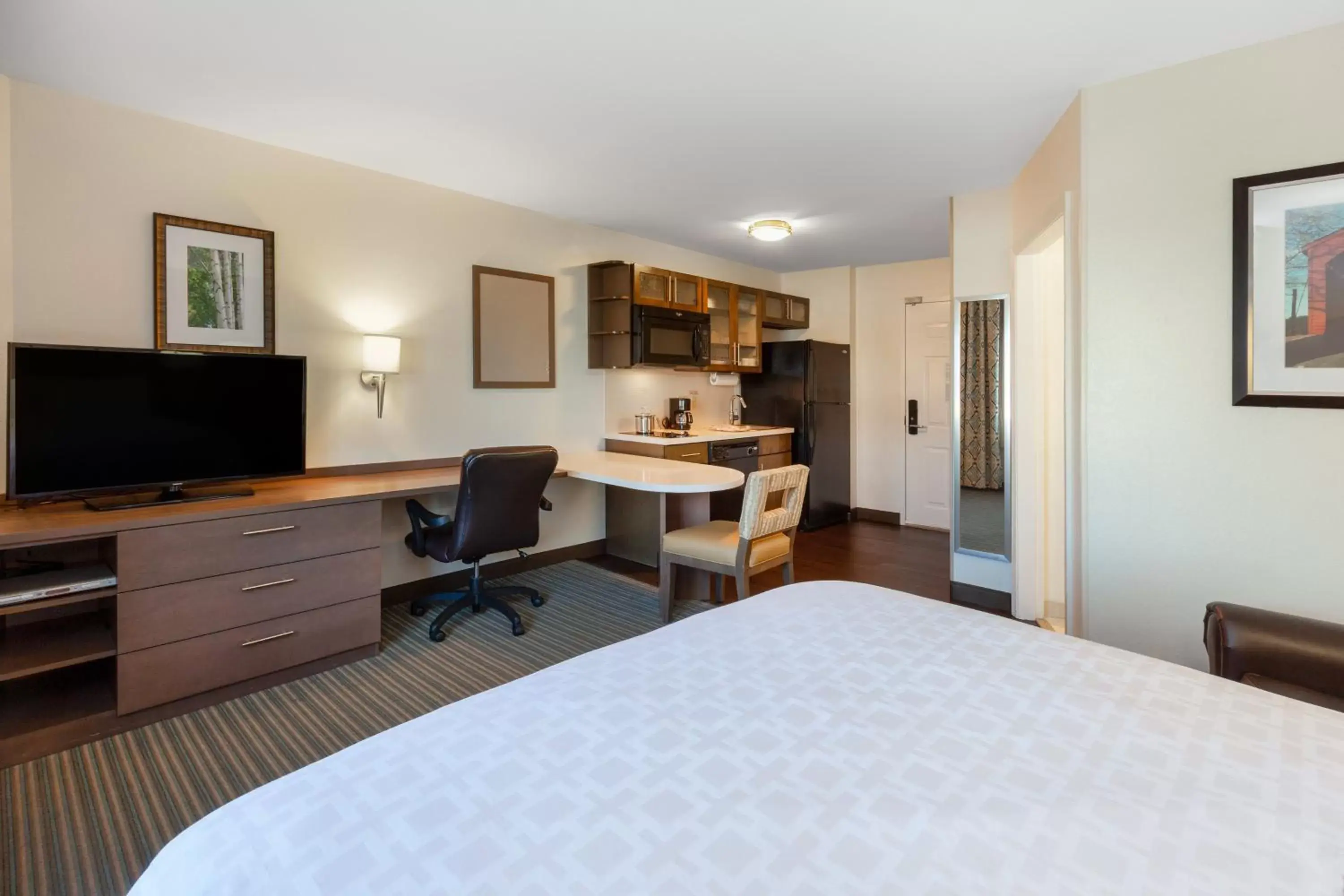 Photo of the whole room, TV/Entertainment Center in Candlewood Suites-West Springfield, an IHG Hotel