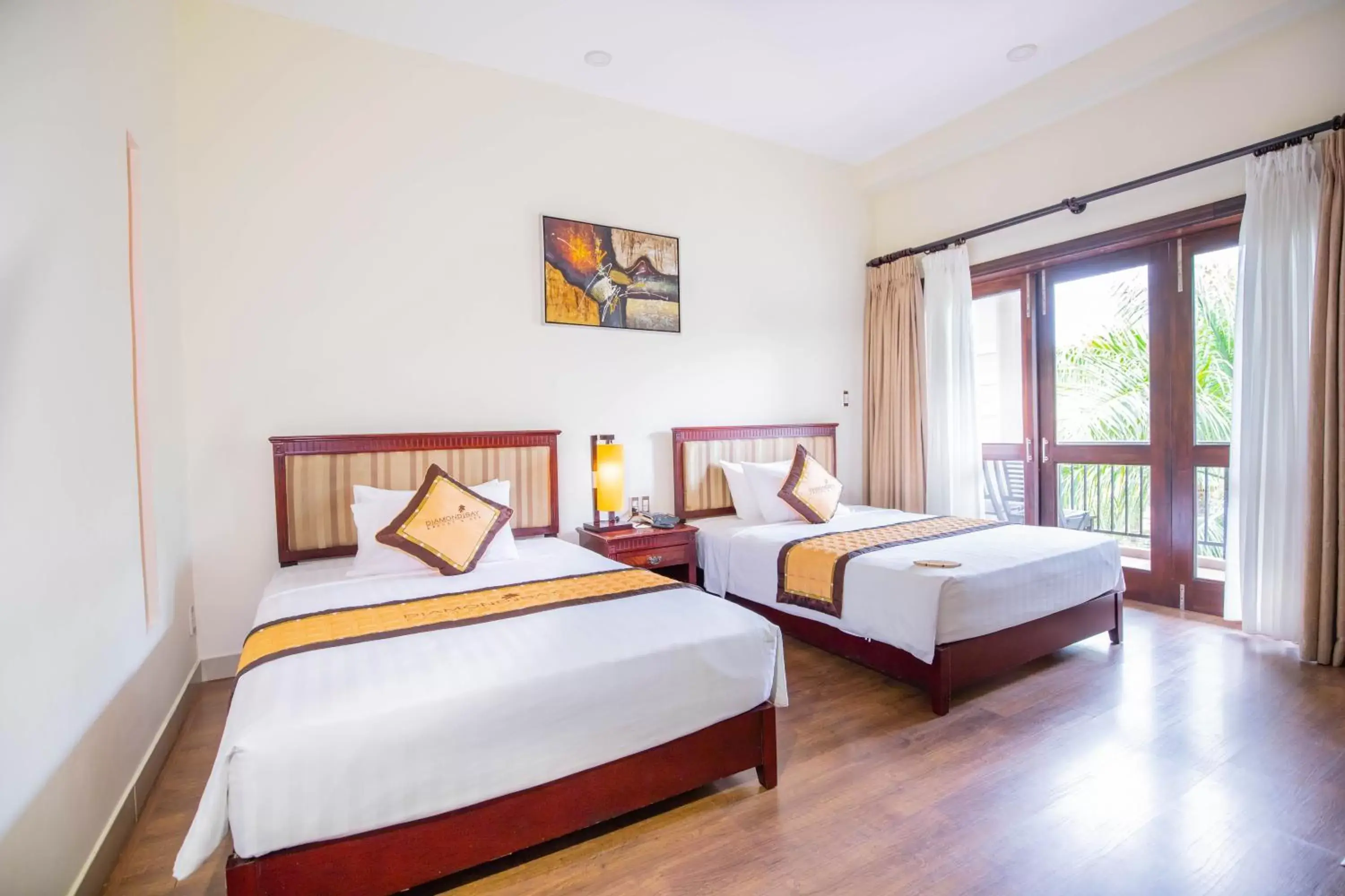 Bed in Diamond Bay Resort & Spa Bed in Diamond Bay Resort & Spa