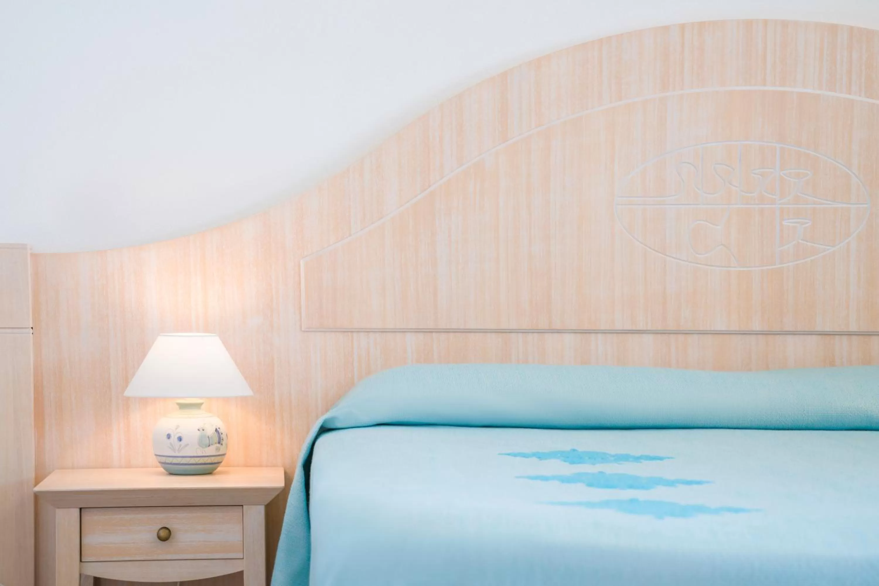 Decorative detail, Bed in Hotel Dei Pini