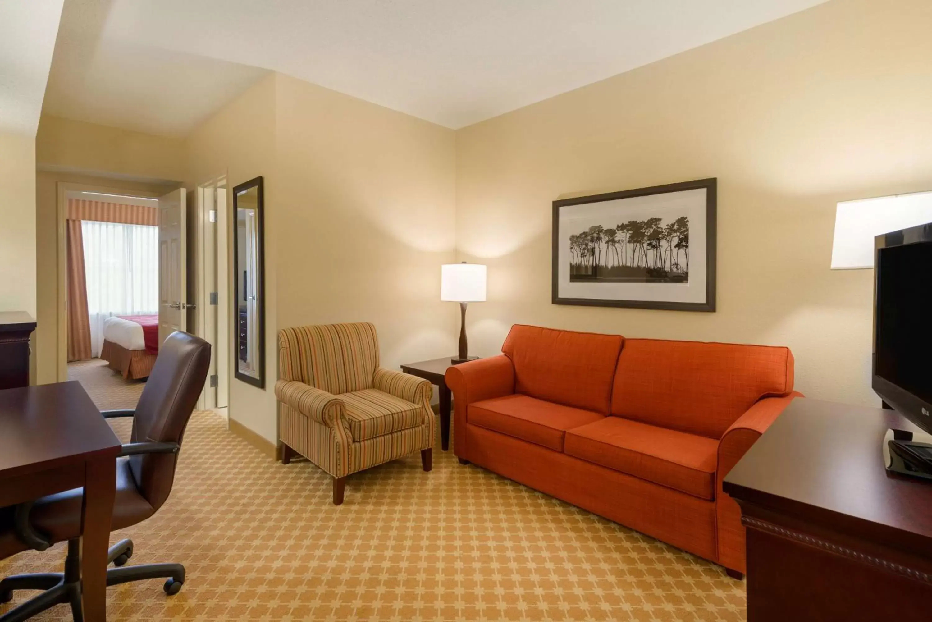 Photo of the whole room, Seating Area in Country Inn & Suites by Radisson, Port Orange-Daytona, FL