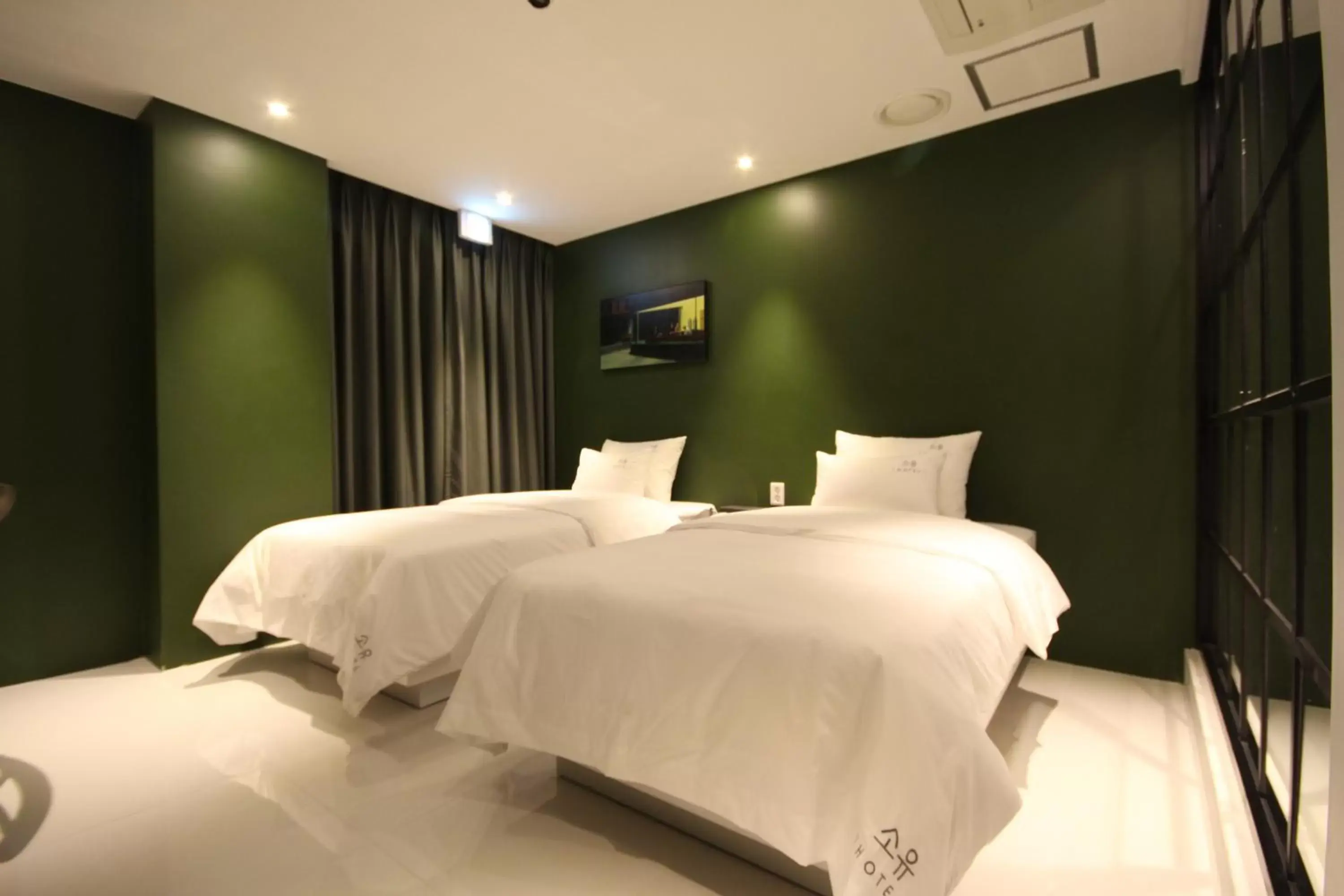 Bed in SOYU Hotel