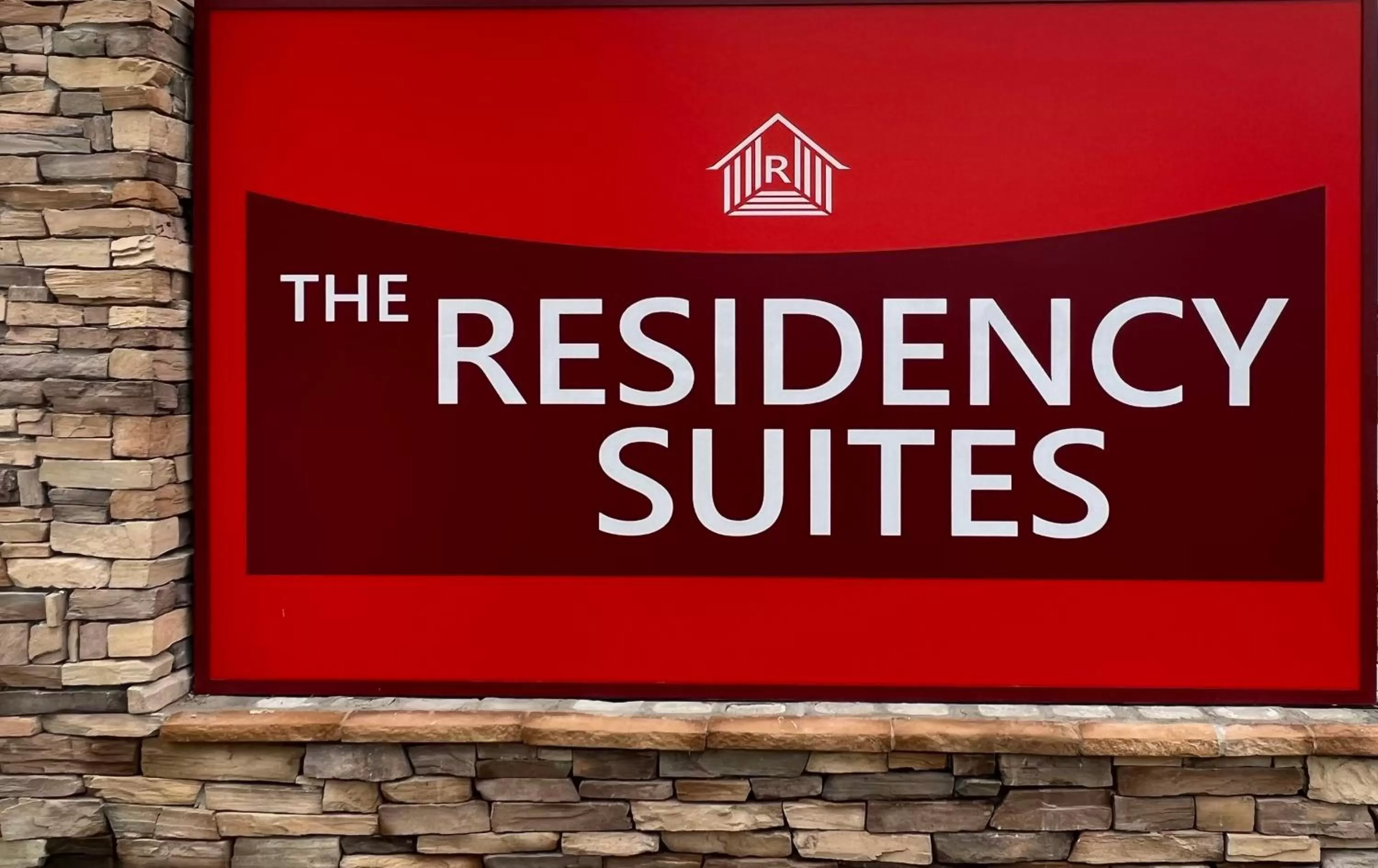 Property logo or sign in The Residency Suites