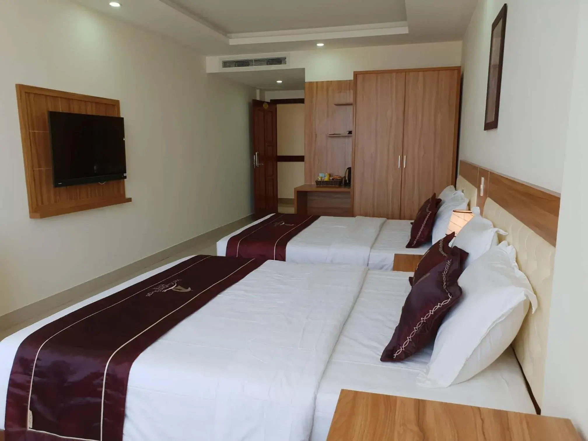 Bed in Phu Cuong Beach Hotel