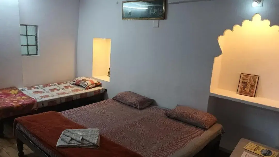 Bed in Jag Niwas Guest House & restaurant