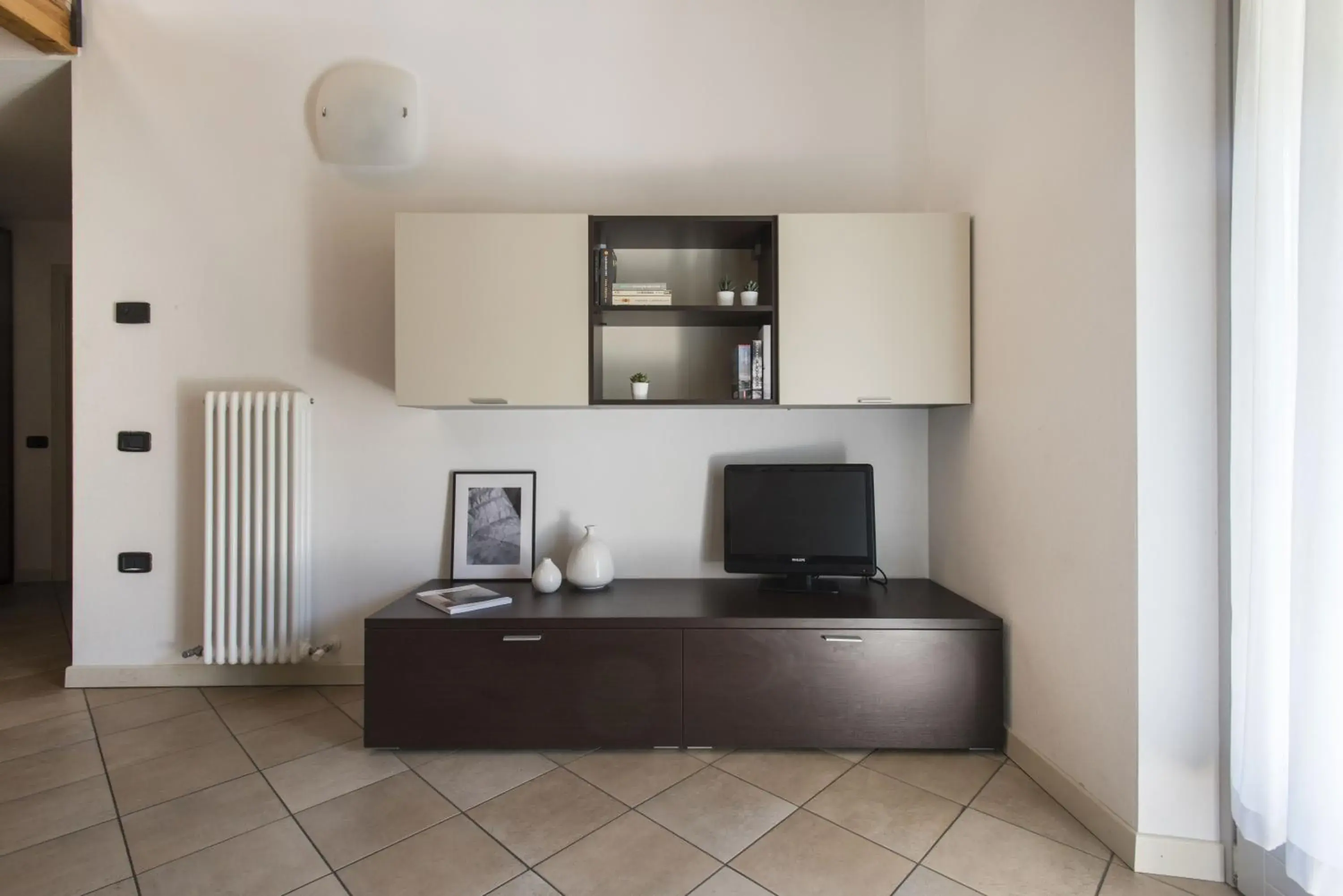 Living room, Kitchen/Kitchenette in Residence La Vigna