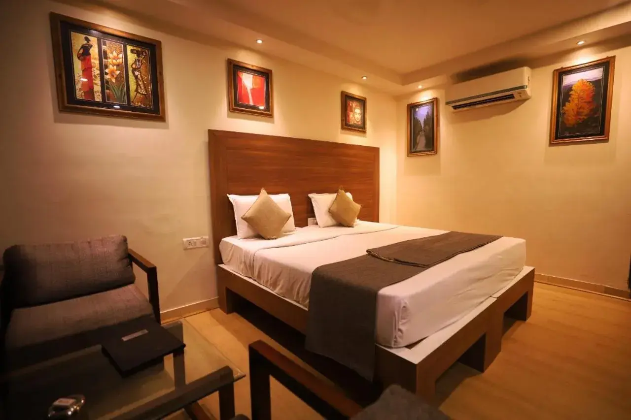 Bed in Hotel Pushpak
