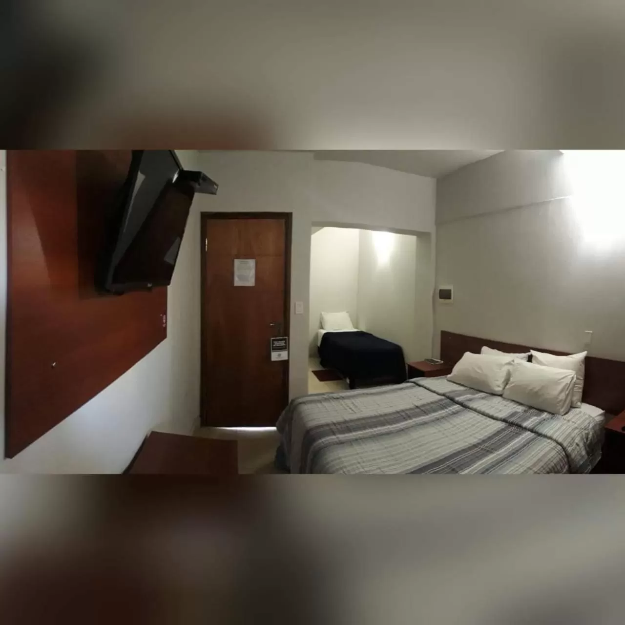 Bed in Madame Lynch Hotel Asuncion