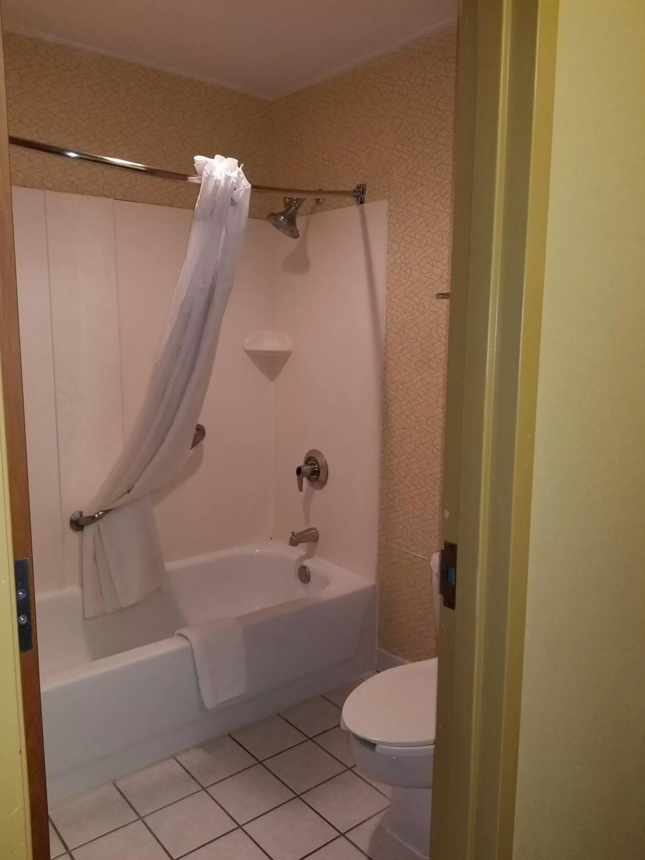 Bathroom in Days Inn by Wyndham Tulsa Central
