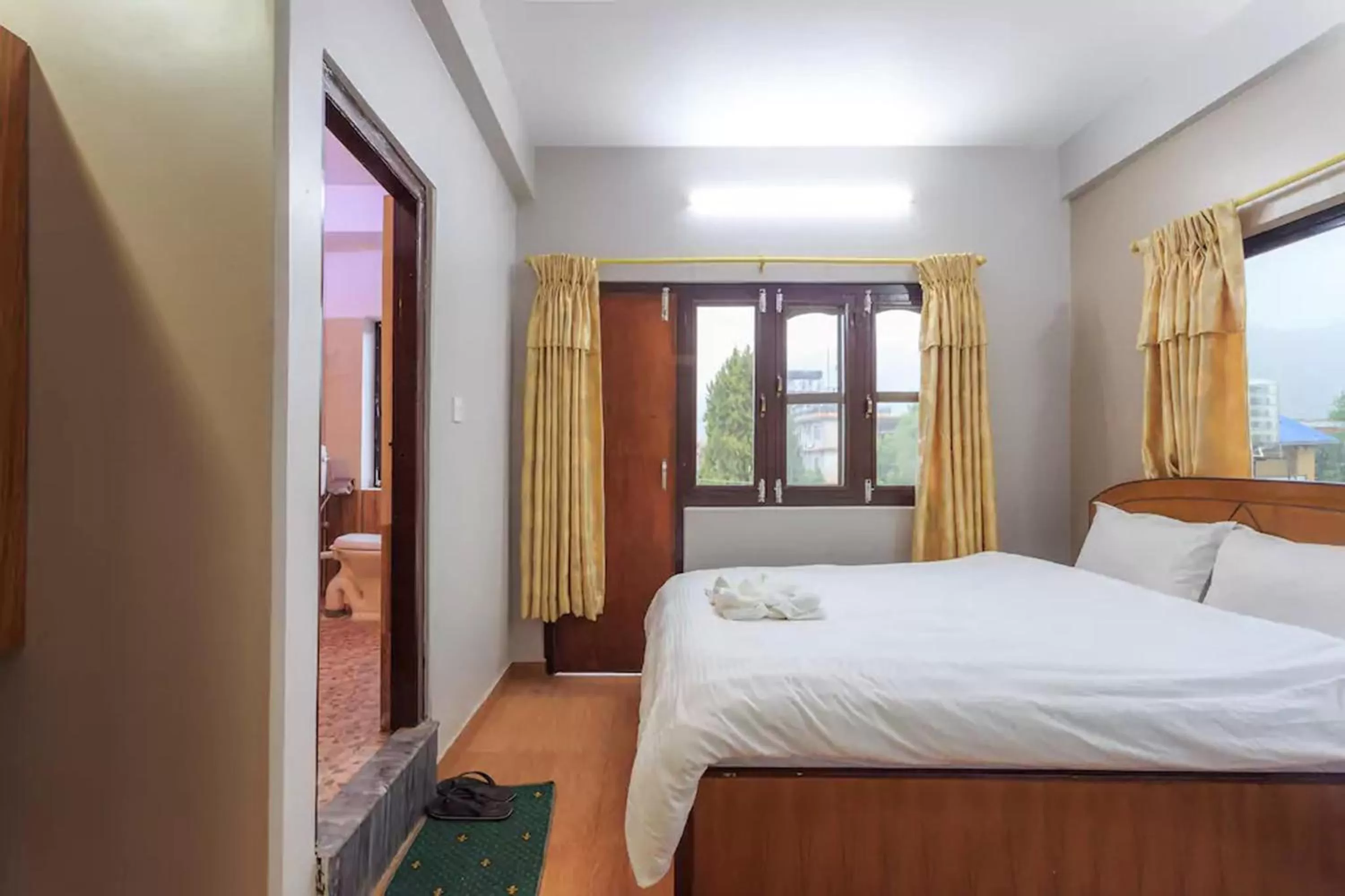 Bed in Hotel Immortal Inn