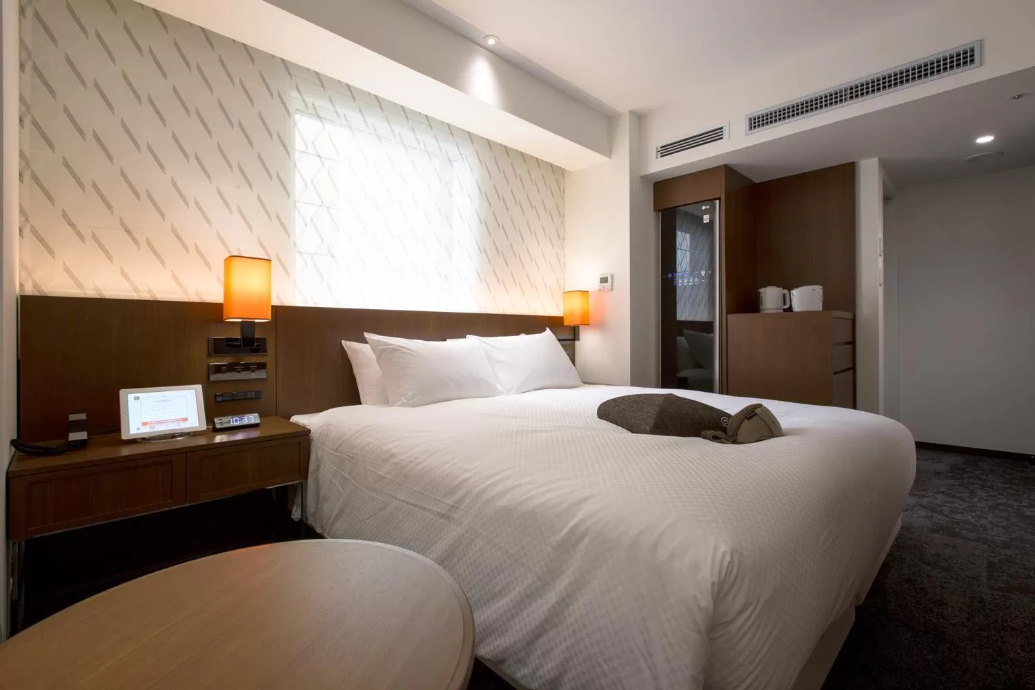 Bed in HOTEL FORZA HAKATAEKI CHIKUSHI-GUCHI Ⅰ