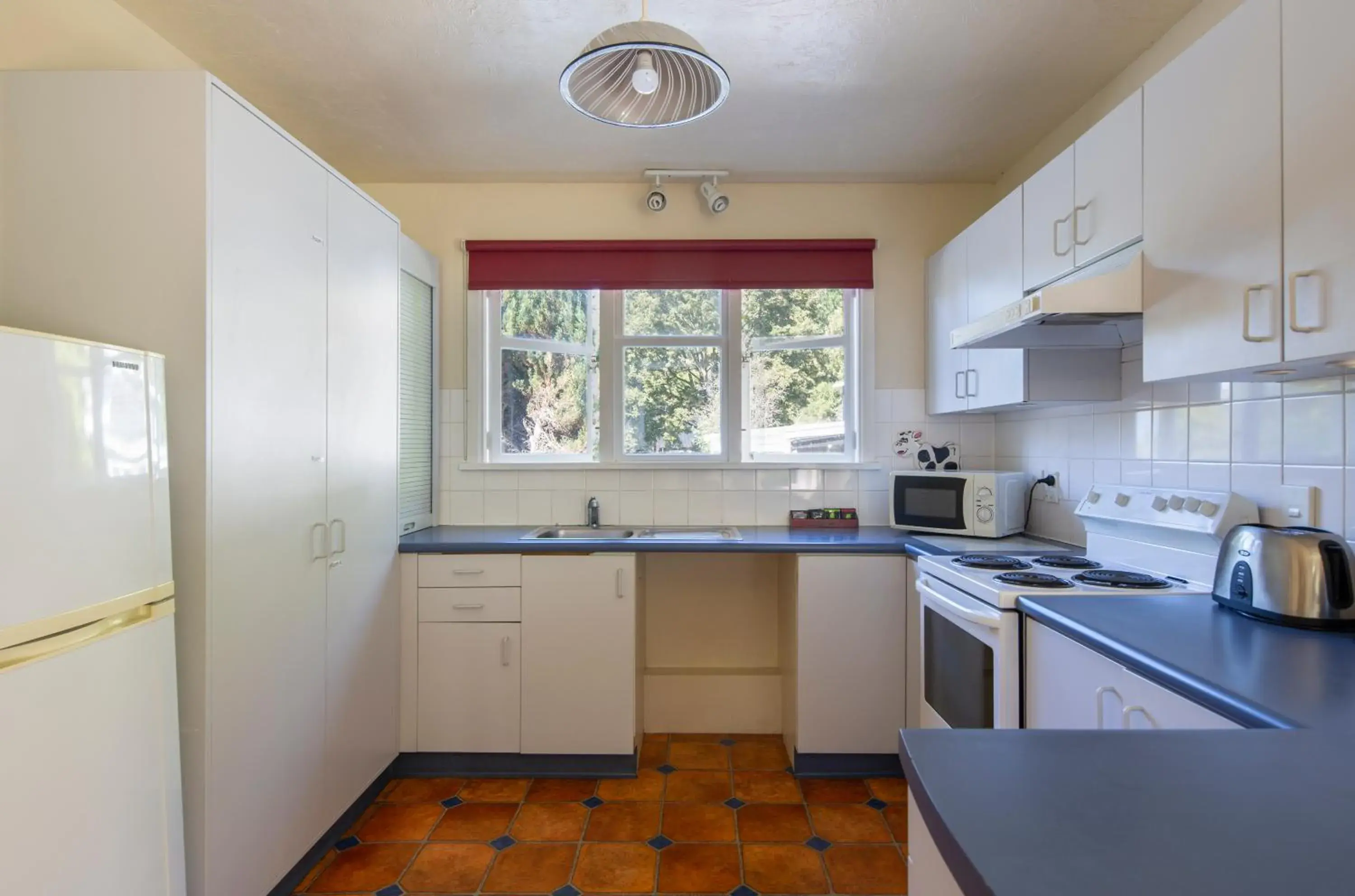 Kitchen/Kitchenette in Pinewood Lodge